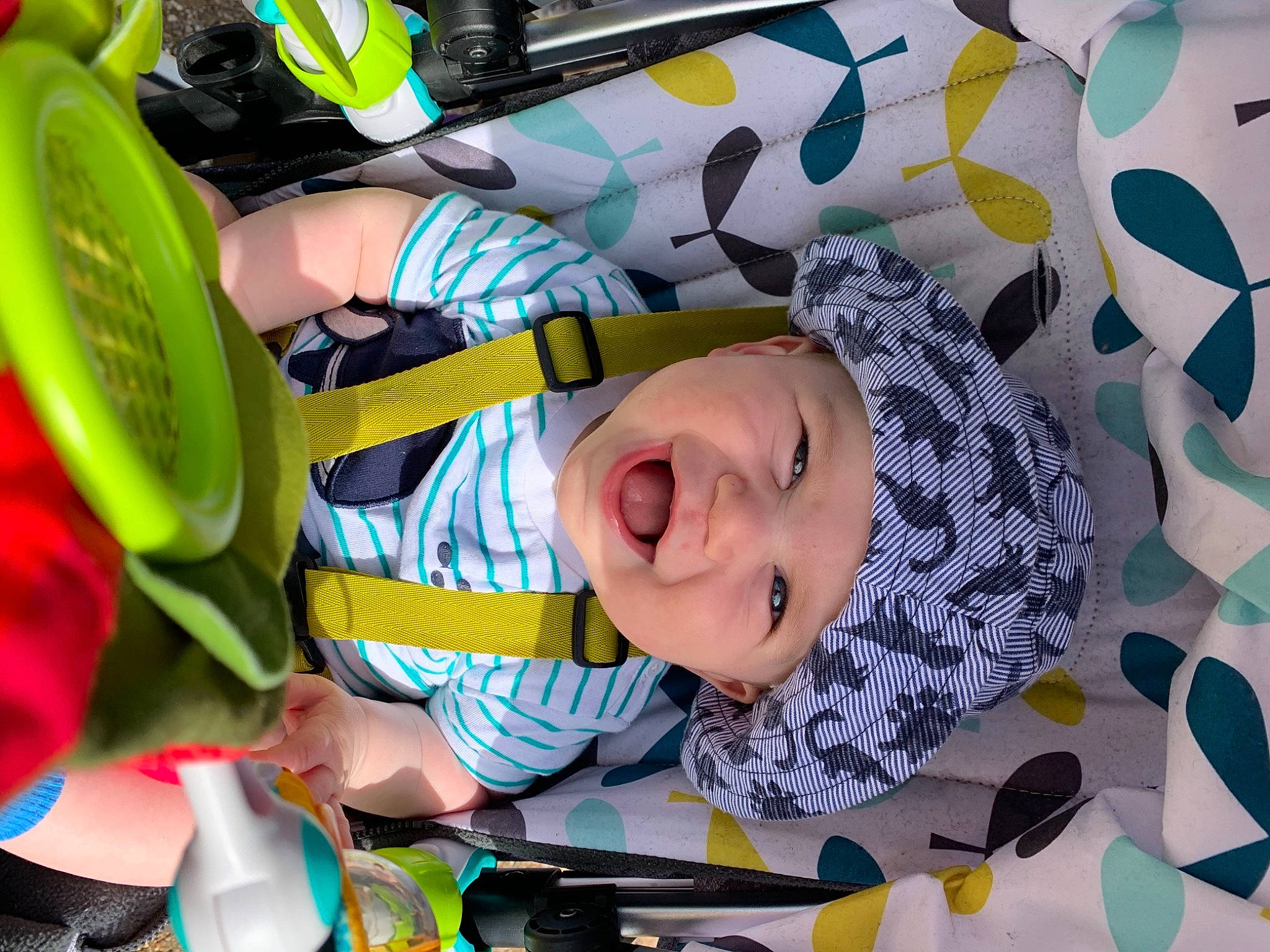 Frederick joined the competition — help win amazing prizes! baby, baby_products, baby_toddler_clothing, baby_toys, child, circle, event, facial_expression, fun, green, happy, headwear, leaf, leisure, linens, pattern, person, play, product, room
