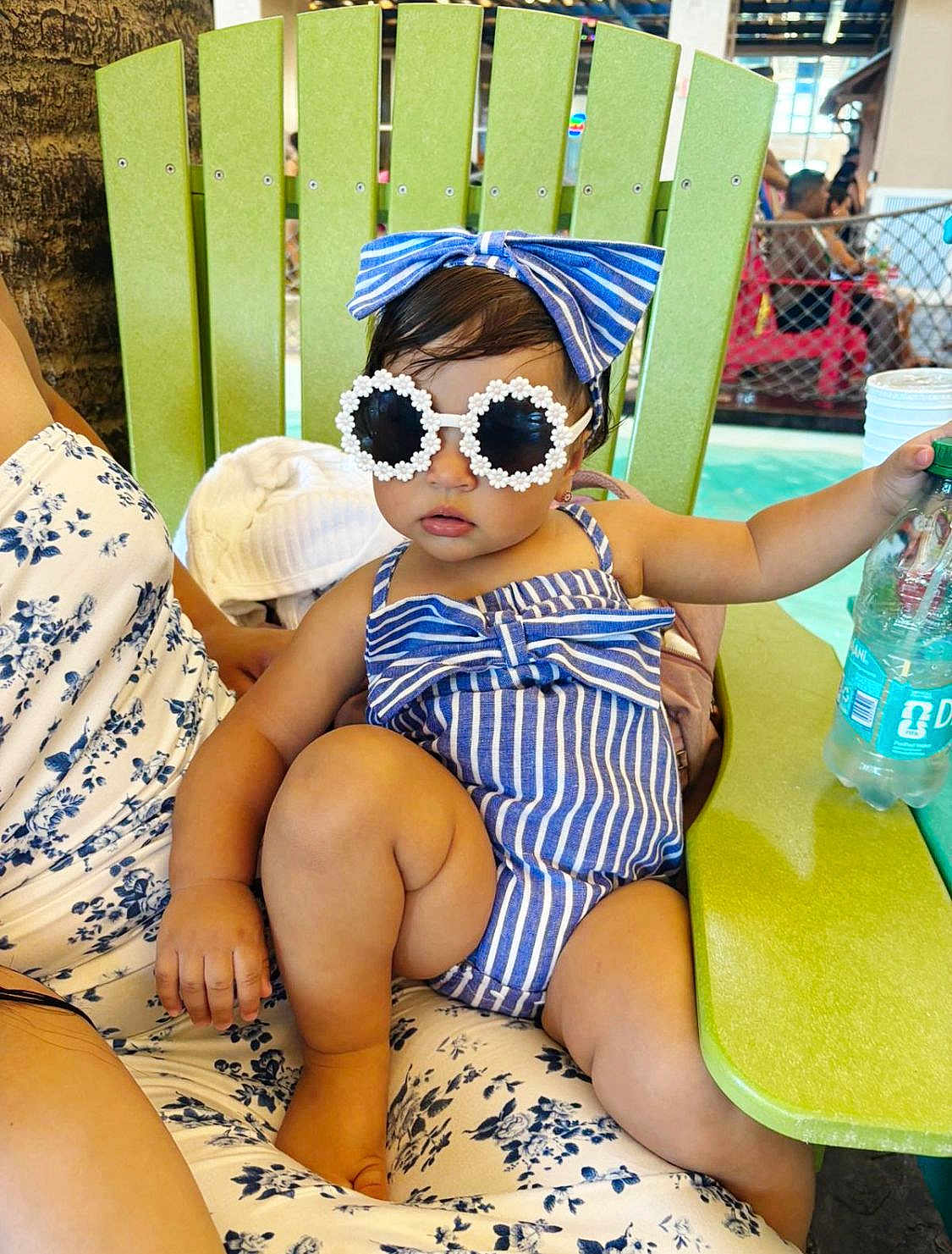 Diana joined the competition — help win amazing prizes! toddler, child, sunglasses, blue_stripes, bow, green_chair, water_bottle, summer, fashion, cute, baby, relaxing, indoor, person, casual, stylish, accessory, seat, clothing, portrait