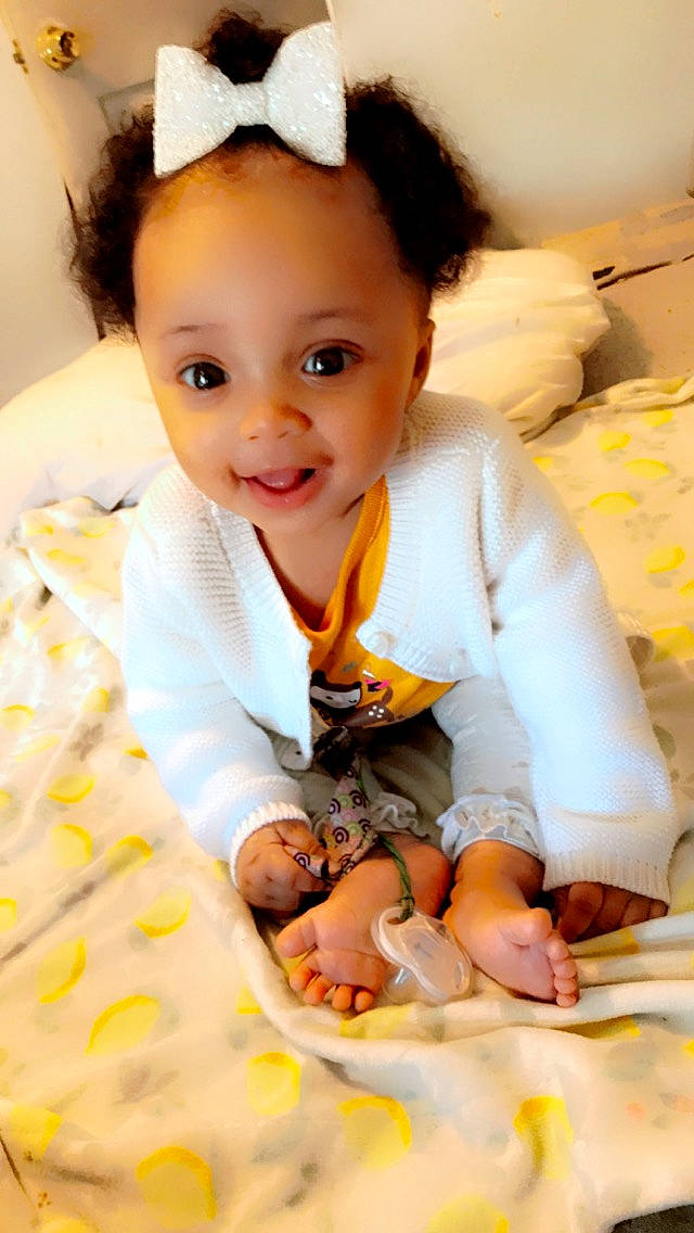 Maiyonna is registered to the contest to win money with this photo: arm, blue, dress, eye, face, finger, fun, green, hair, hairstyle, head, human, joy, lip, people, person, product, room, sitting, smile