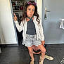 Nelya participe au concours pour gagner de l'argent avec cette photo : attitude, cardigan, casual, child, denim_shorts, door, expression, fashion, floor, girl, hair, home, household_items, indoor, person, playful, pose, sandals, shelf, sunglasses
