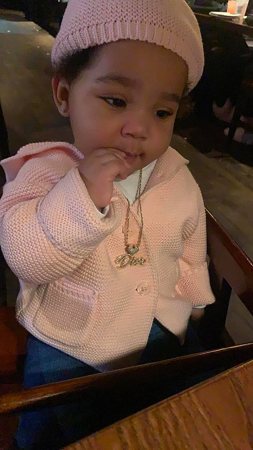 Dior is registered to the contest to win money with this photo: baby, baby_toddler_clothing, cap, cheek, child, cool, eyebrow, eyelash, hairstyle, happy, iris, jewellery, lip, neck, nose, organ, person, sitting, skin, sleeve