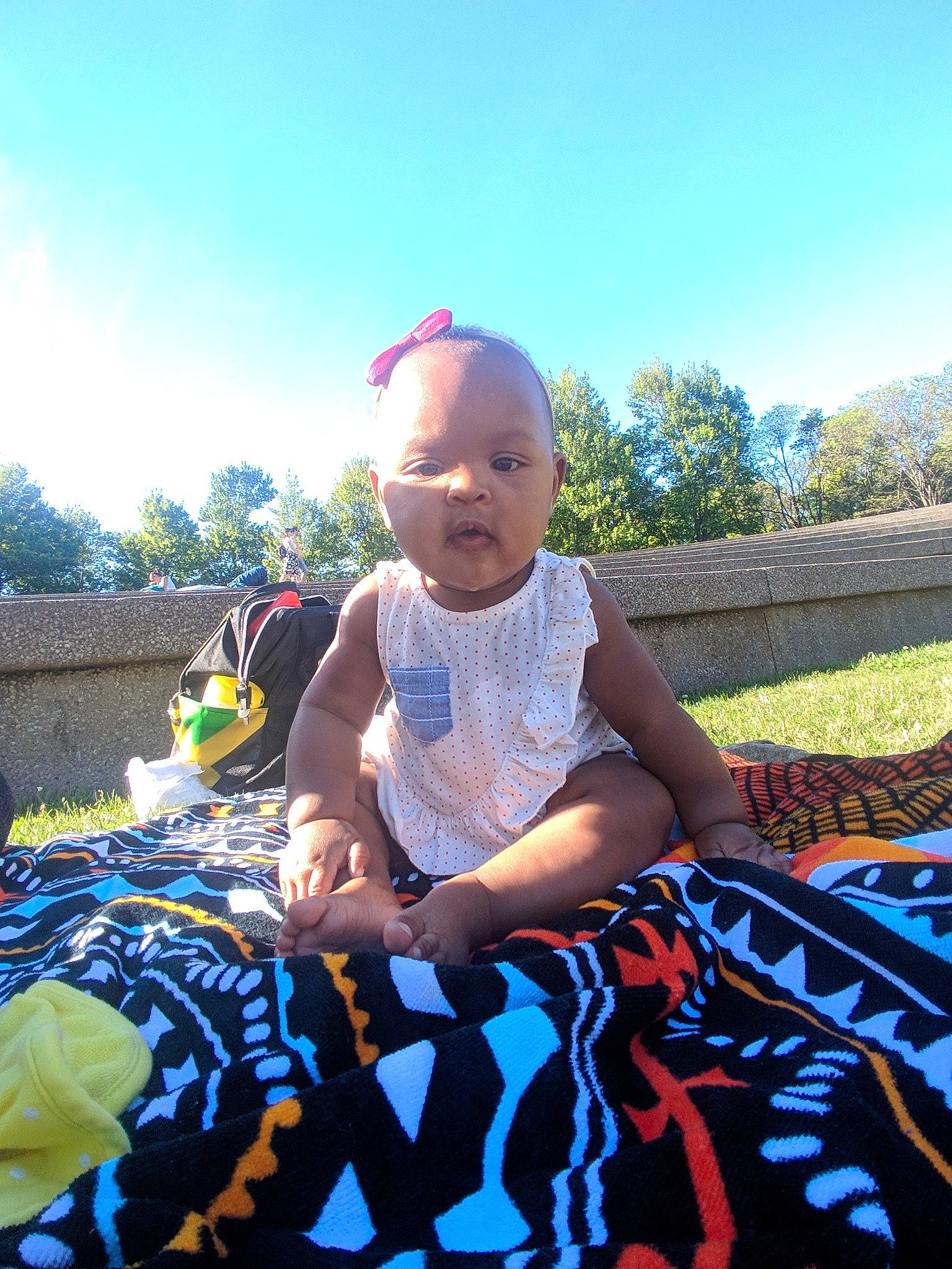 Zola is registered to the contest to win money with this photo: child, cool, fawn, grass, leaf, leisure, person, sitting, sky, summer, toddler, vacation