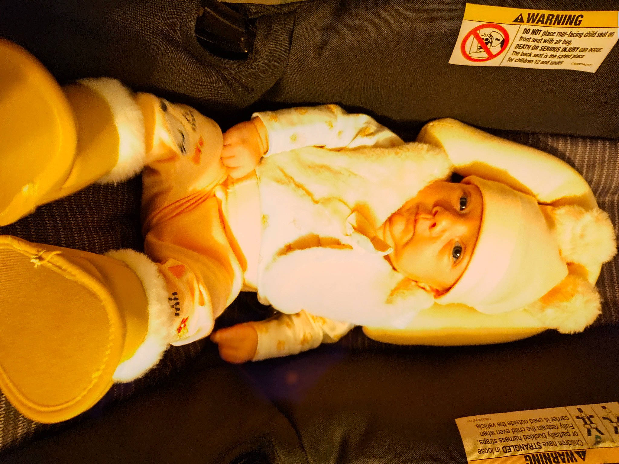 Arabella is registered to the contest to win money with this photo: baby_products, baby_sleeping, bedding, bedtime, blanket, child, comfort, event, headwear, human_leg, knee, linens, nap, person, personal_protective_equipment, room, sleep