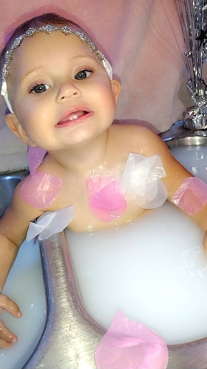 Azaria joined the competition — help win amazing prizes! baby, baby_toddler_clothing, cheek, chest, eye, eyebrow, eyelash, facial_expression, fun, happy, headpiece, iris, lip, organ, person, pink, product, skin, smile, toddler