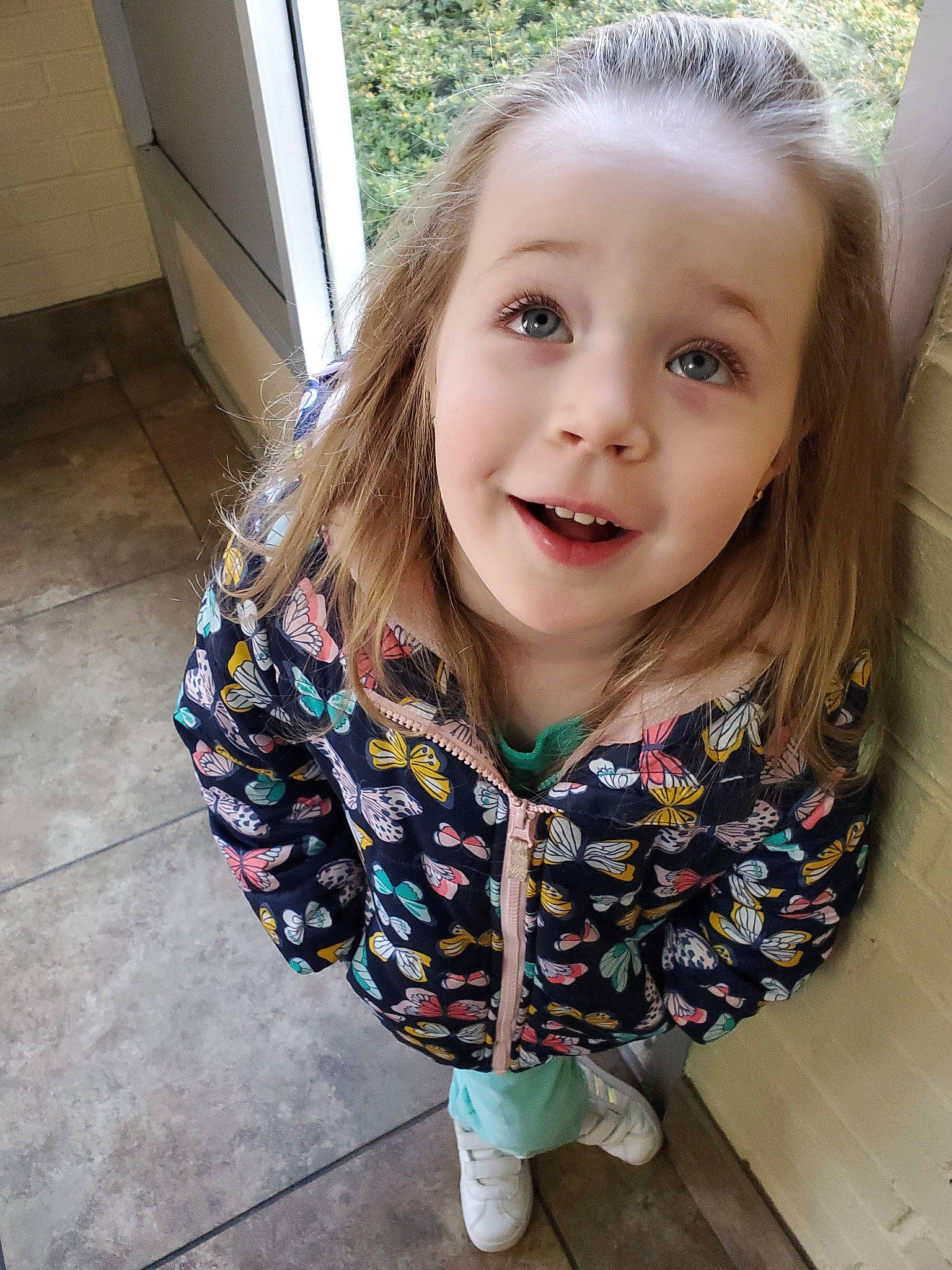 Jaina is registered to the contest to win money with this photo: blond, cheek, child, child_model, eye, face, facial_expression, hair, head, iris, lip, mouth, nose, organ, outerwear, person, photography, skin, smile, toddler