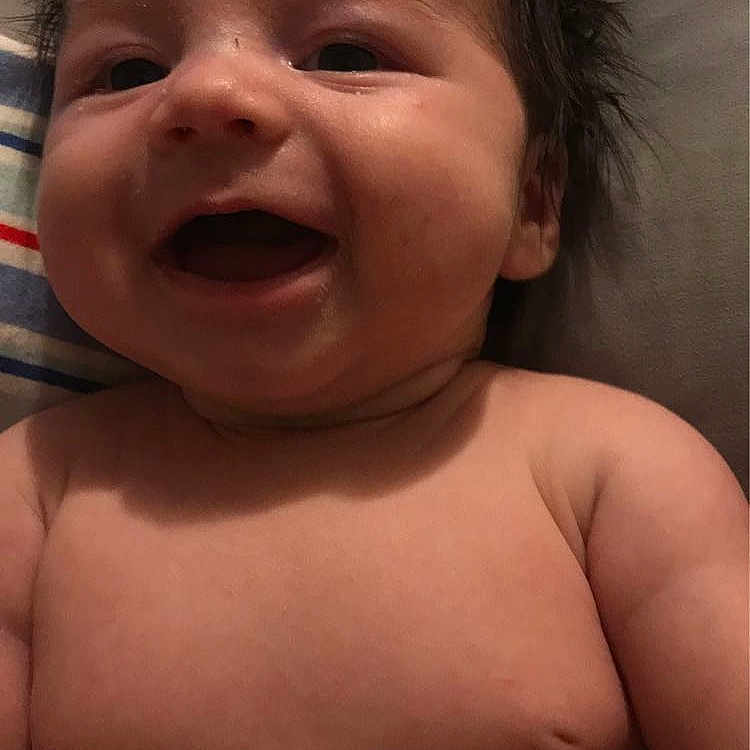 River is registered to the contest to win money with this photo: baby, babylaughing, face, happy, head, laughing, newborn, person, photography, portrait, smile