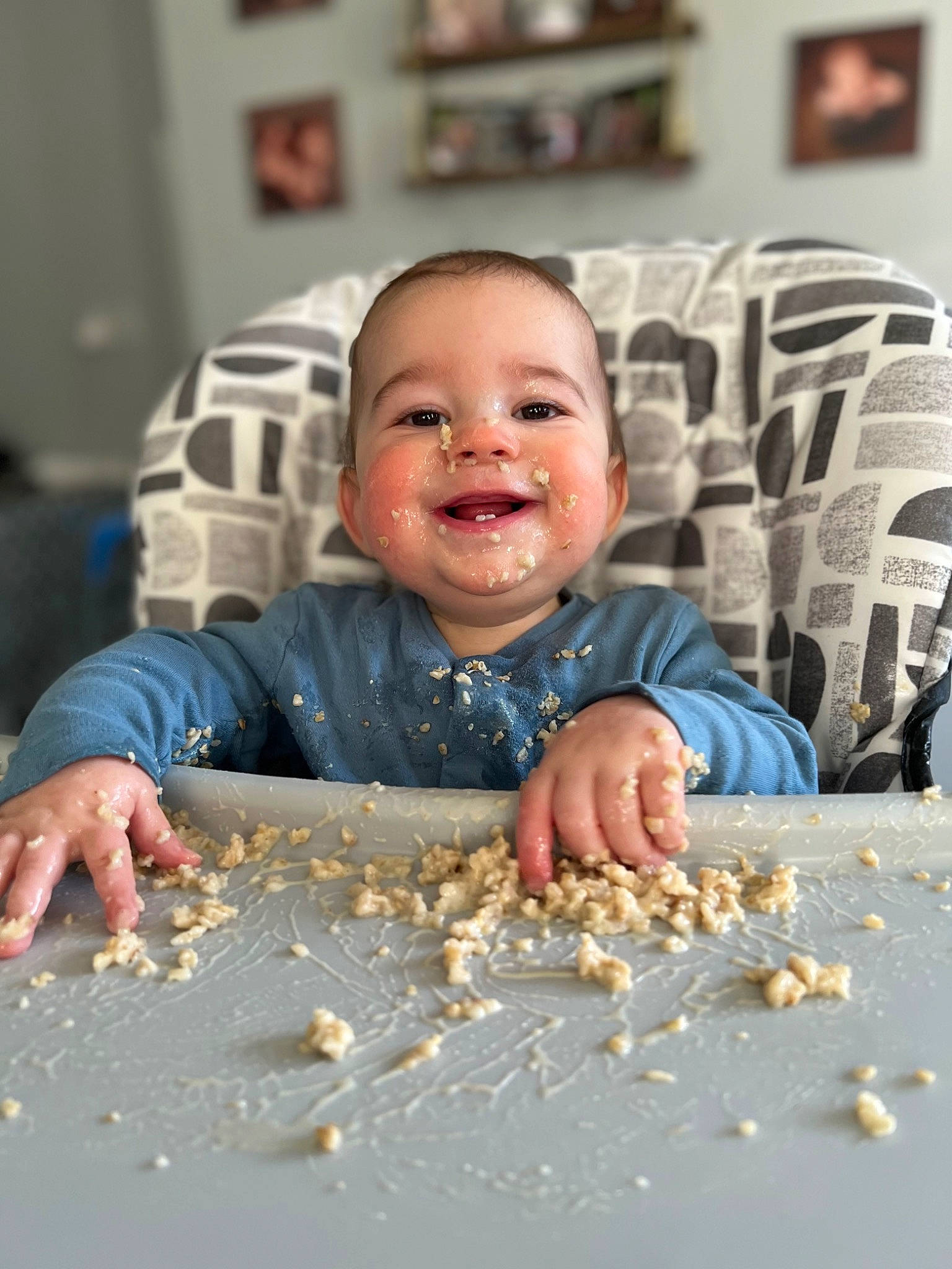 Issac is registered to the contest to win money with this photo: child, couch, flooring, fun, gesture, happy, joy, laugh, pattern, person, picture_frame, play, portrait_photography, room, sitting, smile, soil, thumb, toddler, wood