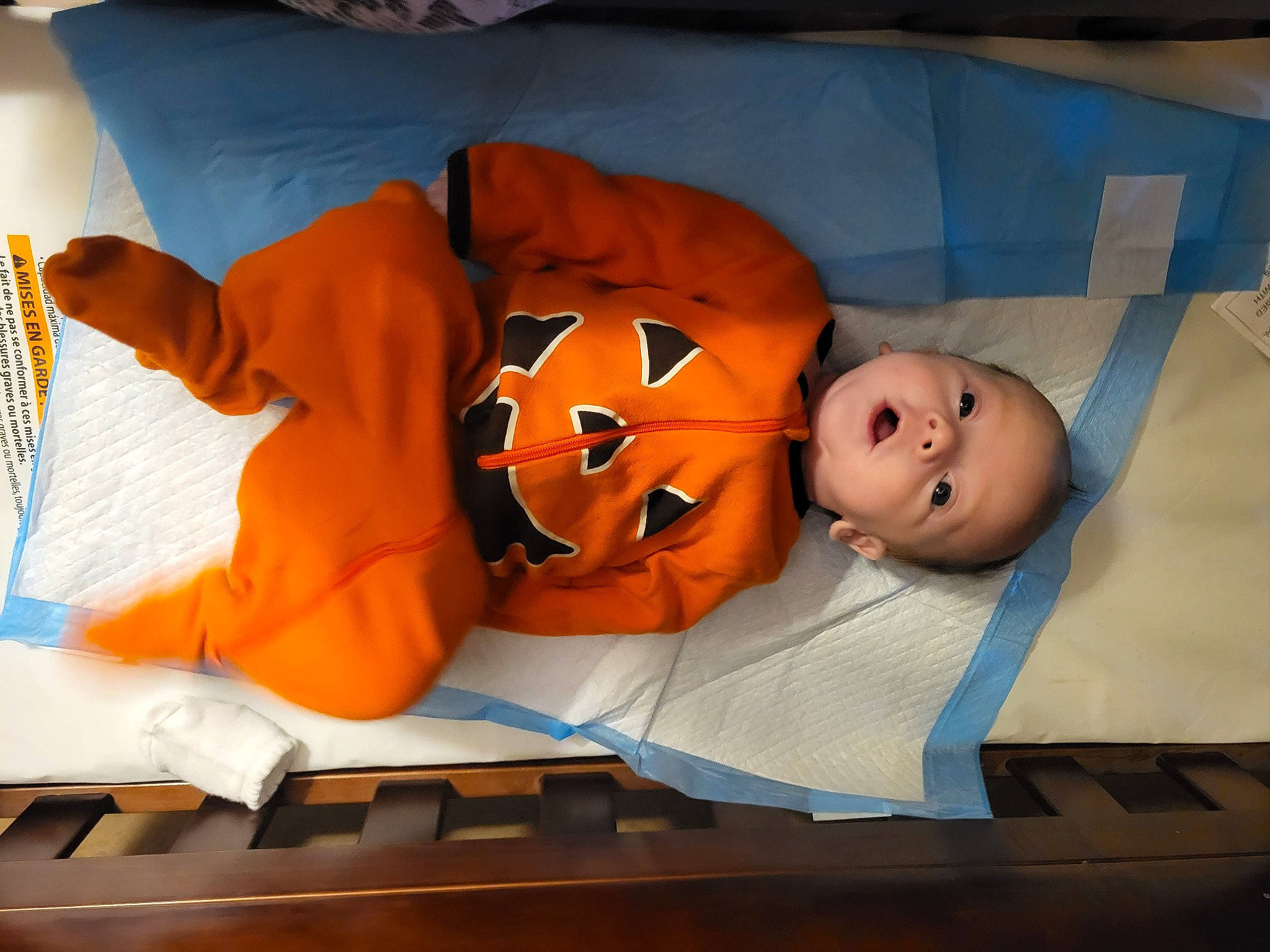 Kyler joined the competition — help win amazing prizes! baby, baby_products, bedtime, child, comfort, flooring, illustration, mammal, orange, person, plush, room, sitting, stuffed_toy, toddler, toy, vertebrate, wood