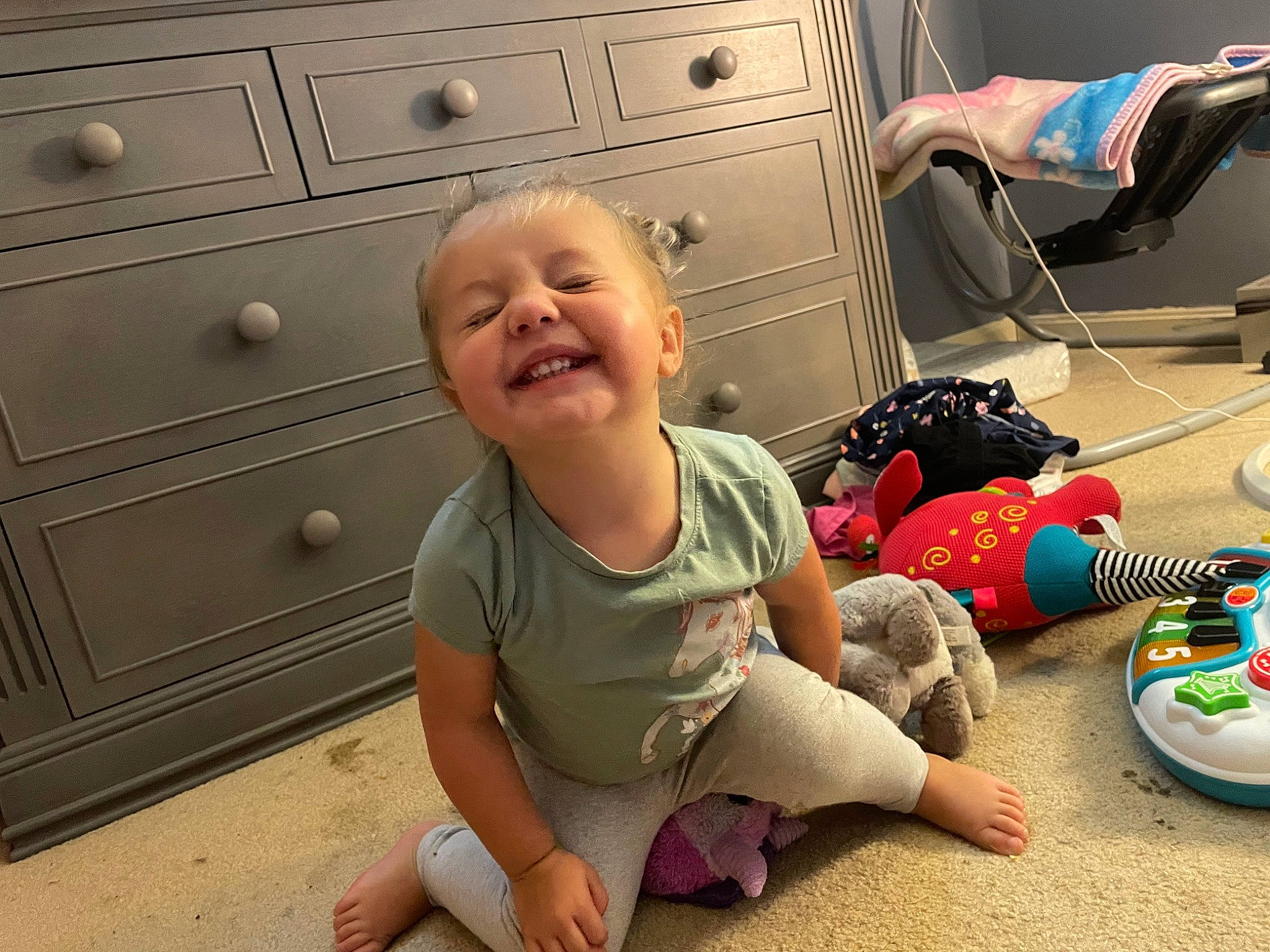 Delaney joined the competition — help win amazing prizes! baby, baby_toddler_clothing, cabinetry, chest, chest_of_drawers, child, drawer, dresser, floor, flooring, foot, fun, hardwood, joint, joy, person, play, room, sitting, smile
