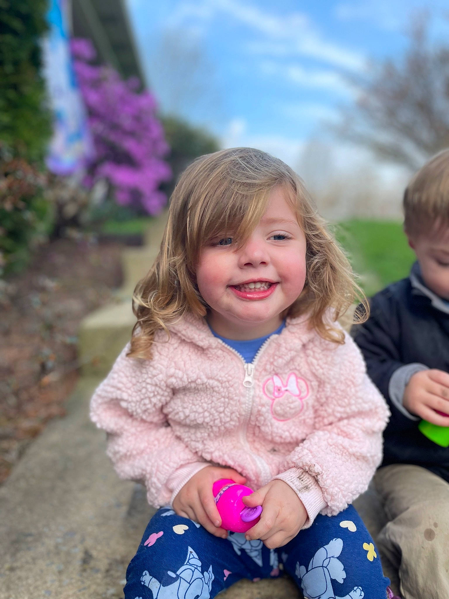 Delaney joined the competition — help win amazing prizes! baby_toddler_clothing, beauty, blond, child, eye, face, fun, grass, hair, happy, head, iris, joy, leisure, people_in_nature, person, pink, plant, sky, smile