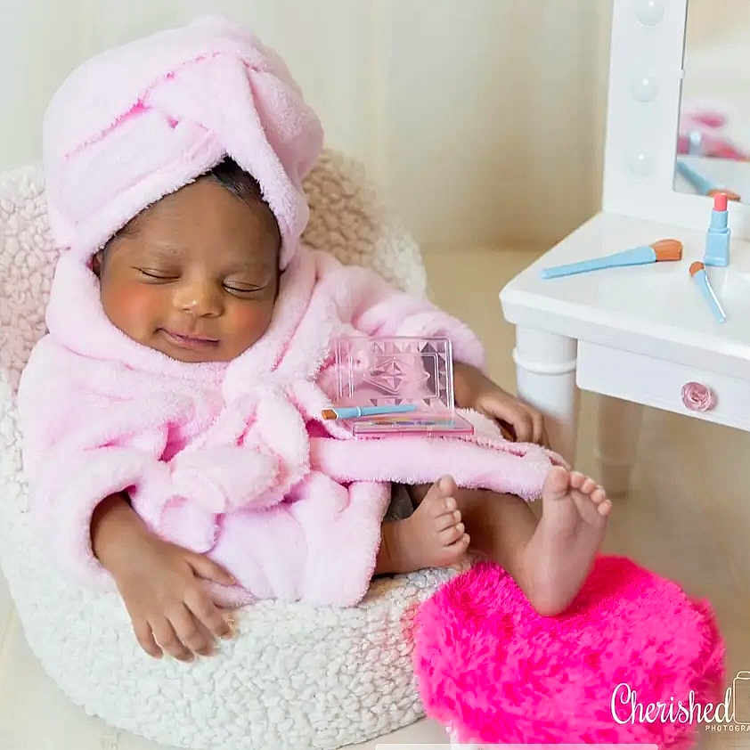 Xanyiah joined the competition — help win amazing prizes! baby, babylaughing, blanket, bonnet, clothing, cushion, face, happy, hat, head, homedecor, newborn, person, photography, portrait, sitting, smile, towel