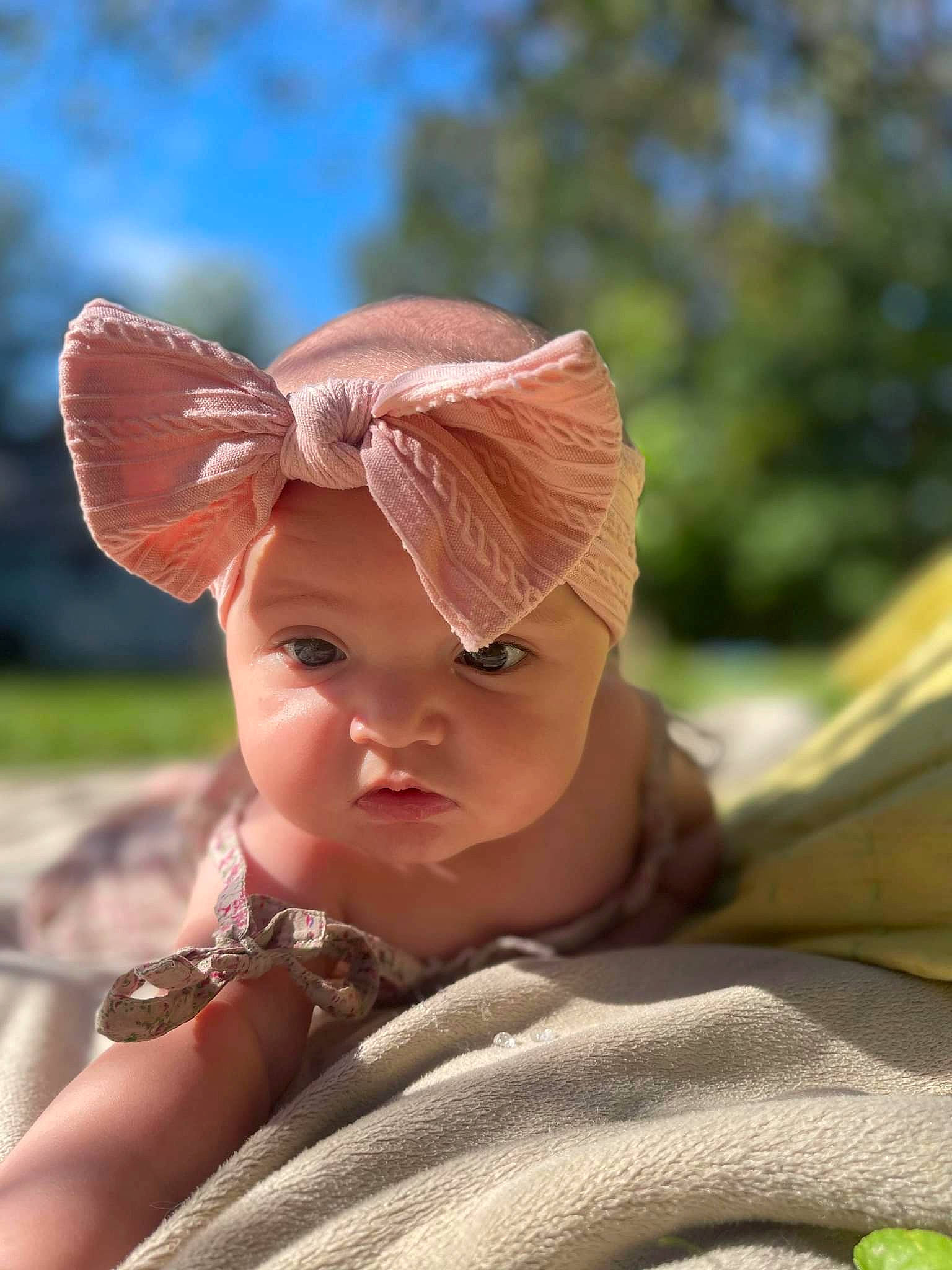Shelby is registered to the contest to win money with this photo: baby, child, costume_accessory, ear, fashion_accessory, fawn, fun, grass, hair_accessory, happy, hat, headband, headpiece, headwear, lip, peach, person, portrait_photography, sitting, skin