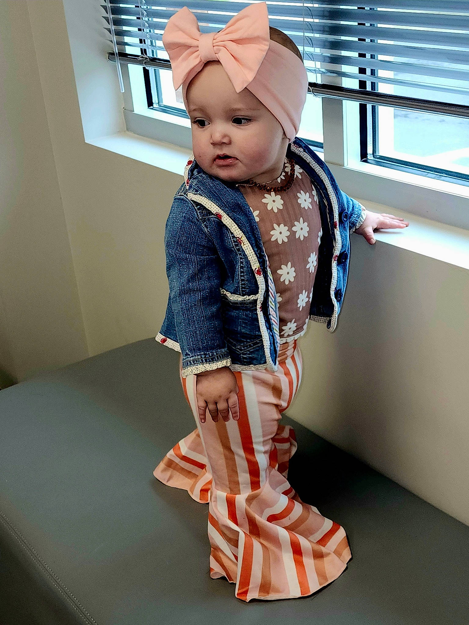 Shelby is registered to the contest to win money with this photo: baby, baby_toddler_clothing, child, costume, day_dress, electric_blue, fashion_accessory, fashion_design, headwear, magenta, neck, one_piece_garment, pattern, peach, person, pink, sleeve, textile, toddler, waist