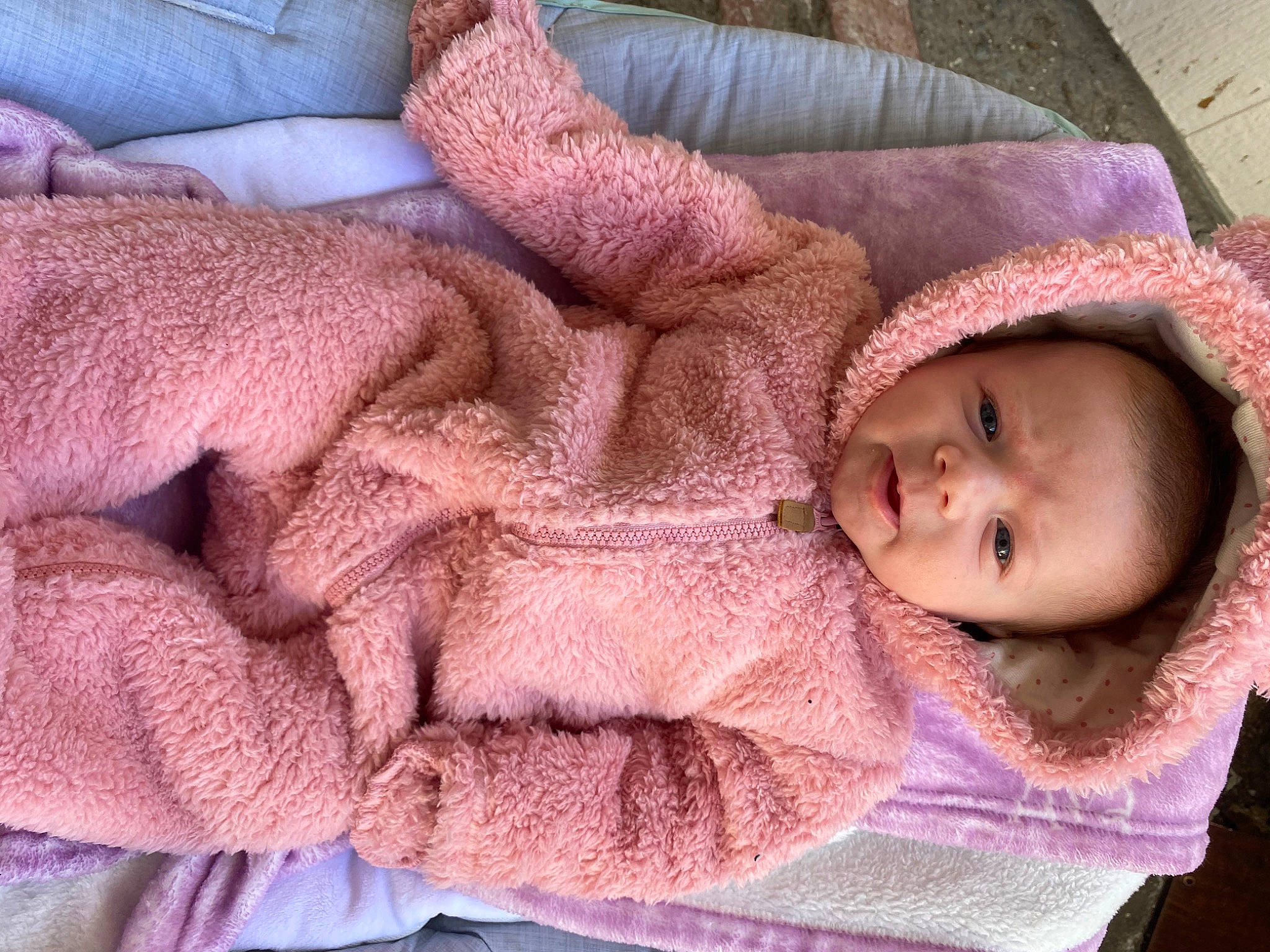 Ava joined the competition — help win amazing prizes! baby, baby_toddler_clothing, cheek, child, close_up, comfort, ear, eye, finger, head, human_body, linens, mouth, nose, person, pink, skin, toddler, vertebrate, wool