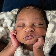Armani joined the competition — help win amazing prizes! baby, sleeping, blanket, soft, infant, peaceful, cute, hands, face, closeup, wrapped, resting, child, newborn, adorable, relaxed, skin, portrait, indoor, comfort