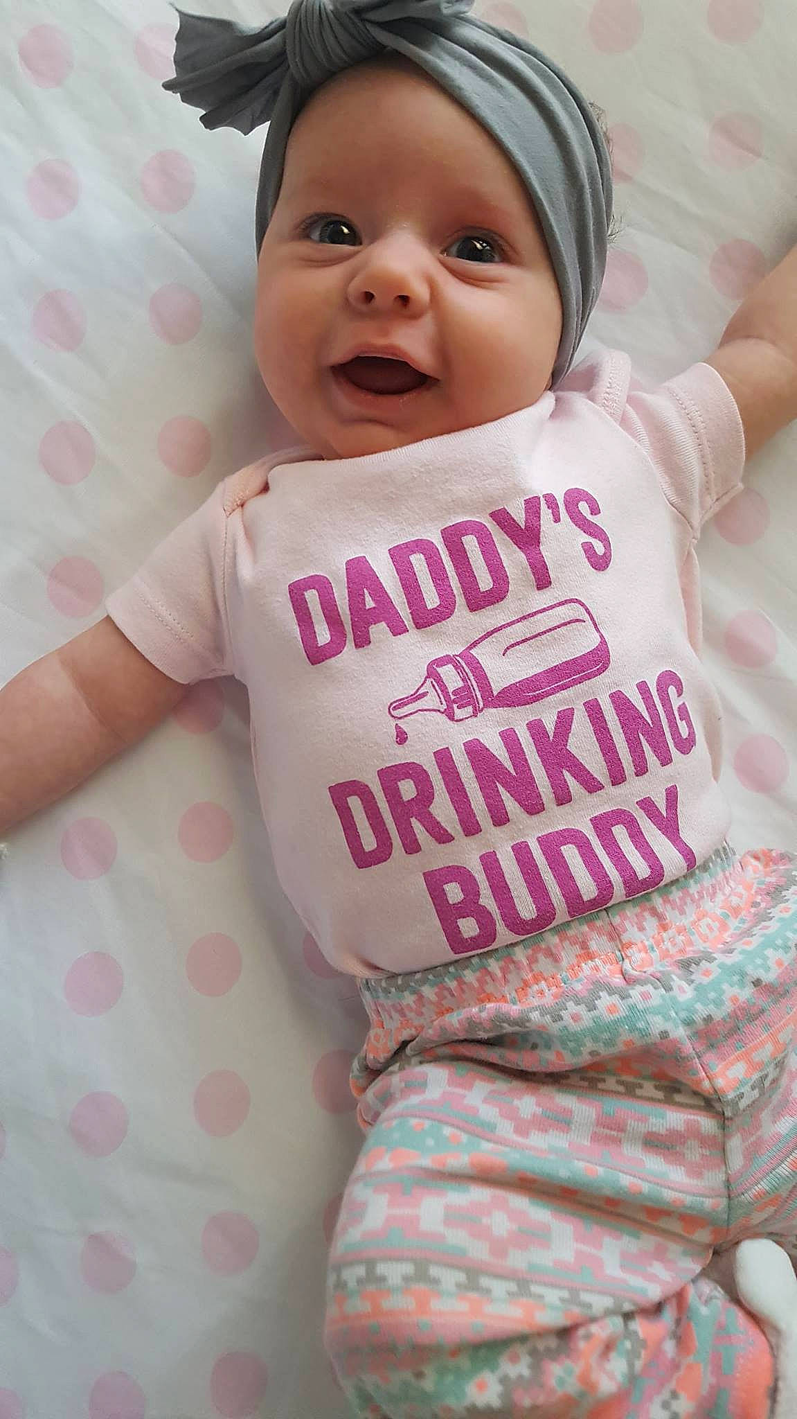 Cambria is registered to the contest to win money with this photo: baby, baby_products, baby_toddler_clothing, beauty, cheek, child, cool, daughter, happy, lip, person, pink, product, skin, sleeve, smile, t_shirt, toddler