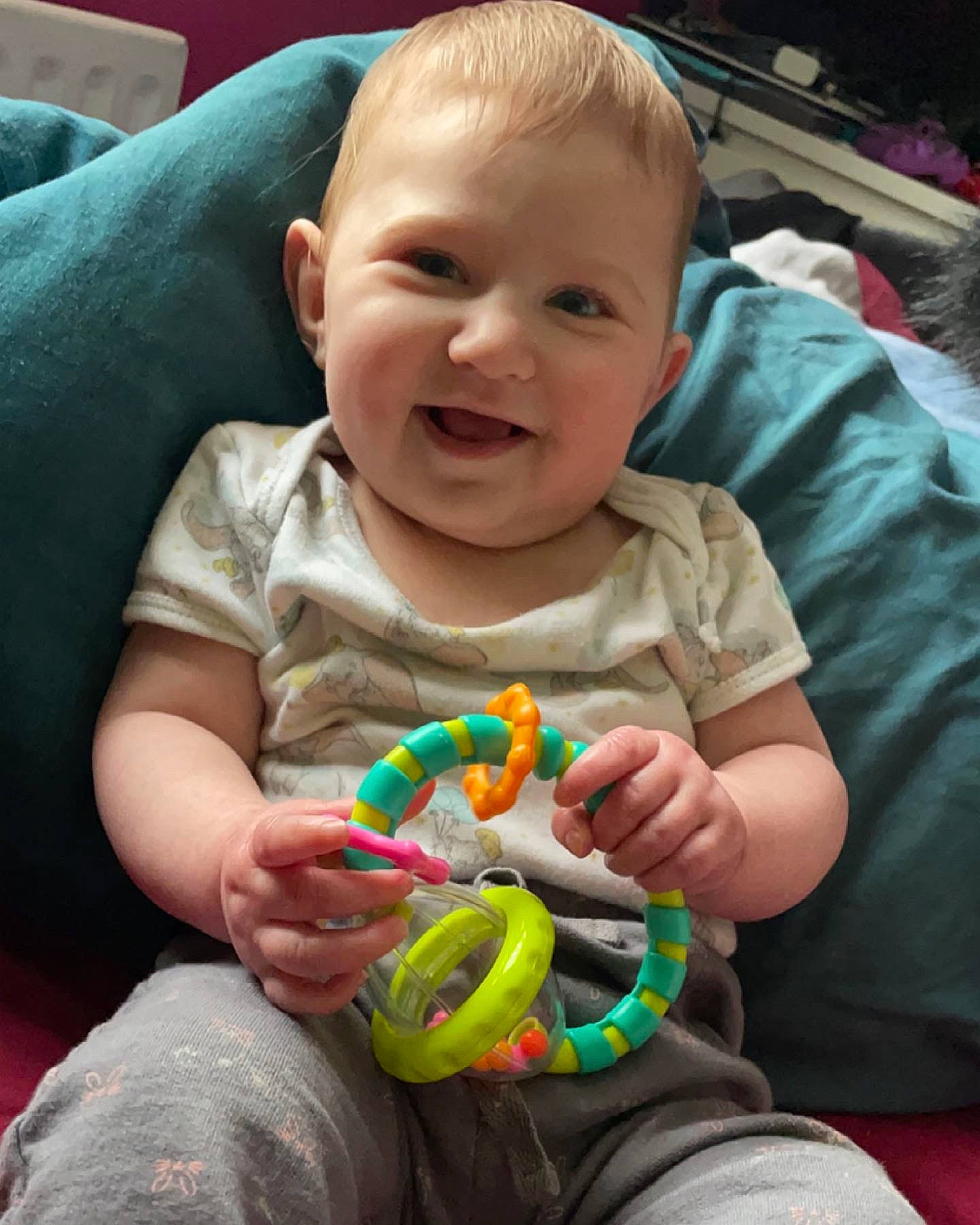 Poppy-rose joined the competition — help win amazing prizes! baby_playing_with_toys, cheek, finger, fun, happy, head, human, human_body, iris, joy, mouth, nose, organ, person, photograph, product, skin, smile, snapshot, textile