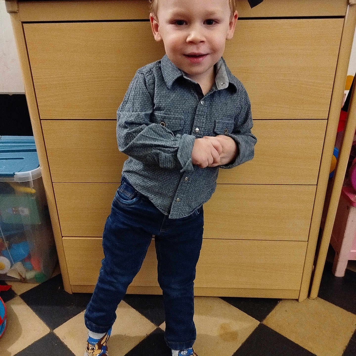 Tomy participe au concours pour gagner de l'argent avec cette photo : boy, cabinet, child, closet, clothing, coat, cupboard, drawer, face, footwear, furniture, head, jeans, male, pants, person, photography, portrait, shoe, wood