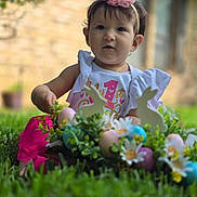 Valerie joined the competition — help win amazing prizes! baby, child, crown, headband, grass, flowers, easter_eggs, bunny, outdoor, cute, portrait, celebration, pink, white_clothing, garden, nature, holiday, spring, festive, one_year_old