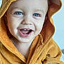 toddler, child, smiling, blue_eyes, hooded_robe, orange_robe, animal_hood, cute, happy, indoor, portrait, baby, soft_texture, warm_clothing, closeup, face, expression, joyful, small_teeth, cozy