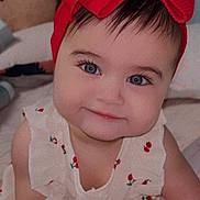 Aaliyah joined the competition — help win amazing prizes! baby, child, red_bow, headband, blue_eyes, smiling, dress, cherry_pattern, teddy_bear, indoor, cute, portrait, infant, happy, young_child, sitting, soft_lighting, closeup, face, adorable