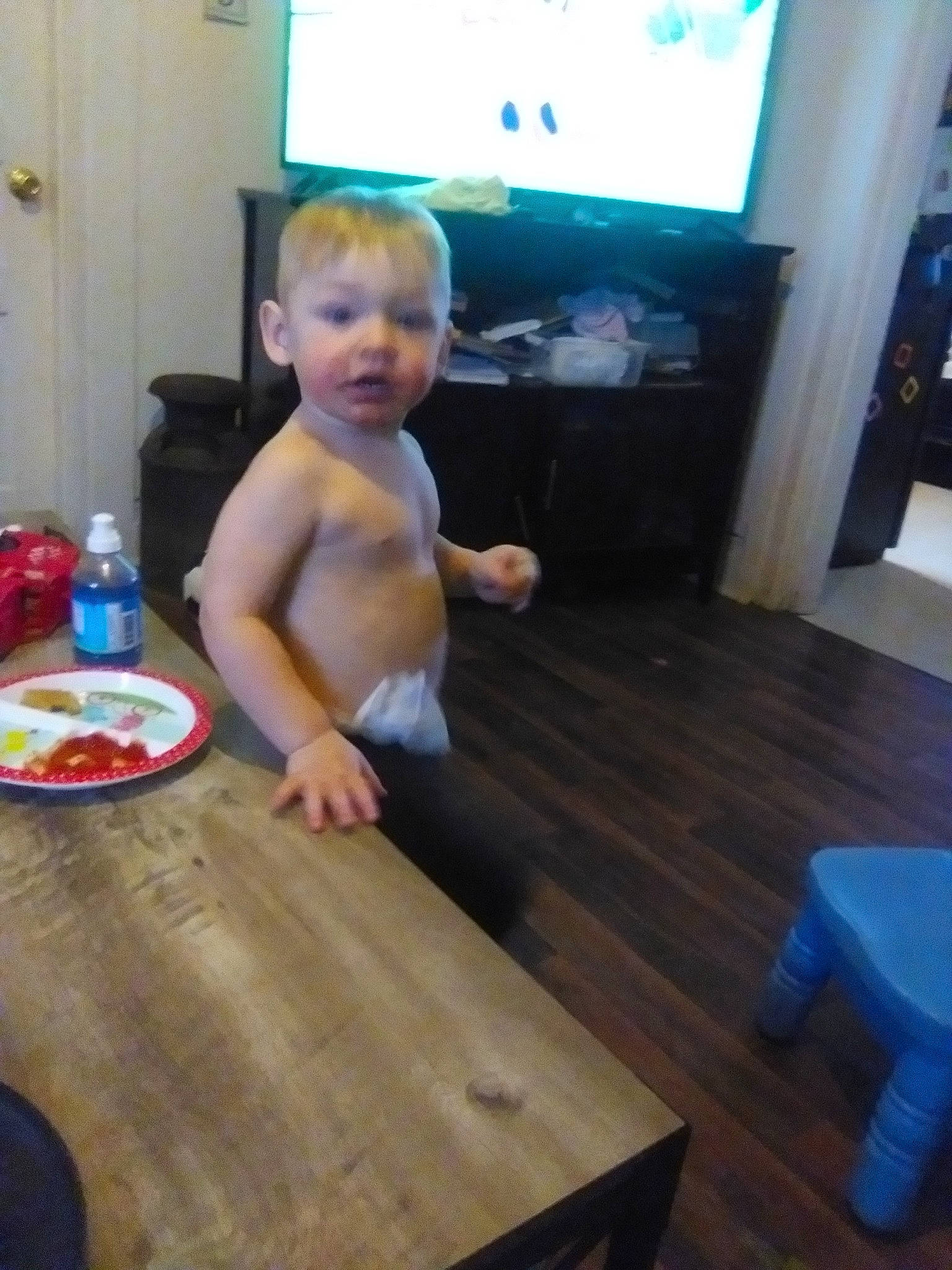 Aiden joined the competition — help win amazing prizes! bottle, child, desk, flooring, fun, hardwood, kitchen, laminate_flooring, person, play, room, sitting, table, tableware, television, thumb, toddler, varnish, wood, wood_flooring