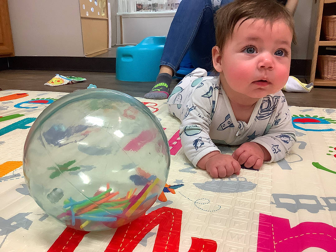 Mary joined the competition — help win amazing prizes! baby, baby_toddler_clothing, ball, cabinetry, carmine, child, circle, cupboard, door, event, flooring, fun, person, play, room, sharing, sitting, toddler, tummy_time, visual_arts