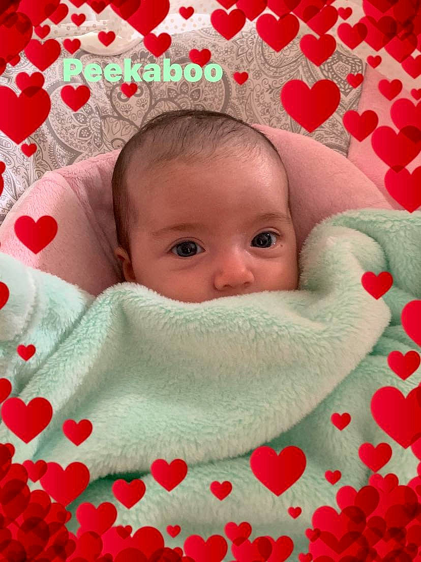 Kilani joined the competition — help win amazing prizes! baby, baby_sleeping, blanket, cheek, child, close_up, head, lip, mouth, person, pink, red, skin, textile, toddler