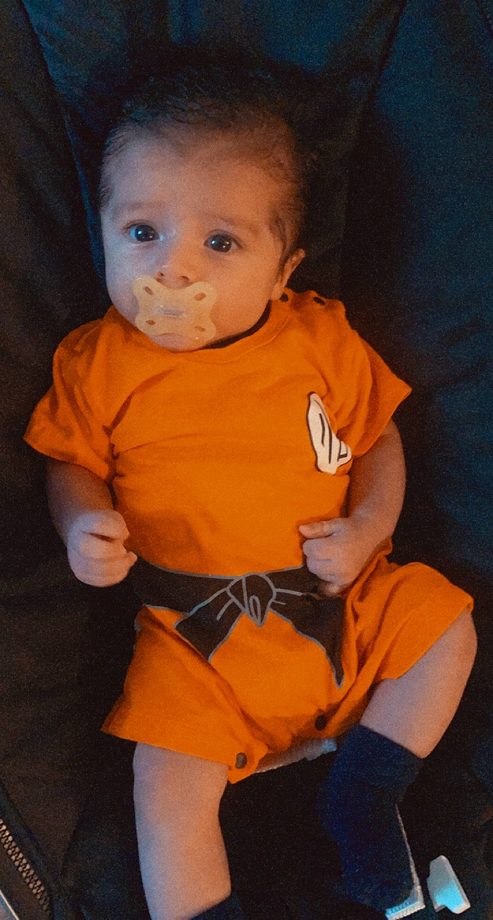 Azrael joined the competition — help win amazing prizes! baby, baby_toddler_clothing, cheek, elbow, finger, fun, head, iris, lip, mouth, neck, nose, orange, person, shoulder, sitting, sleeve, t_shirt, thigh, toddler