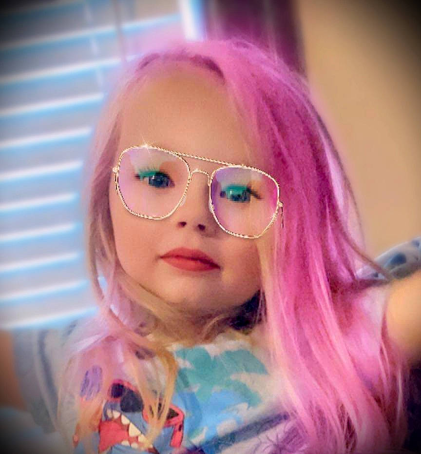 Rayah is registered to the contest to win money with this photo: bangs, barbie, cheek, doll, eyelash, eyewear, glasses, goggles, happy, lip, long_hair, magenta, person, pink, purple, smile, sunglasses, toy, violet, vision_care