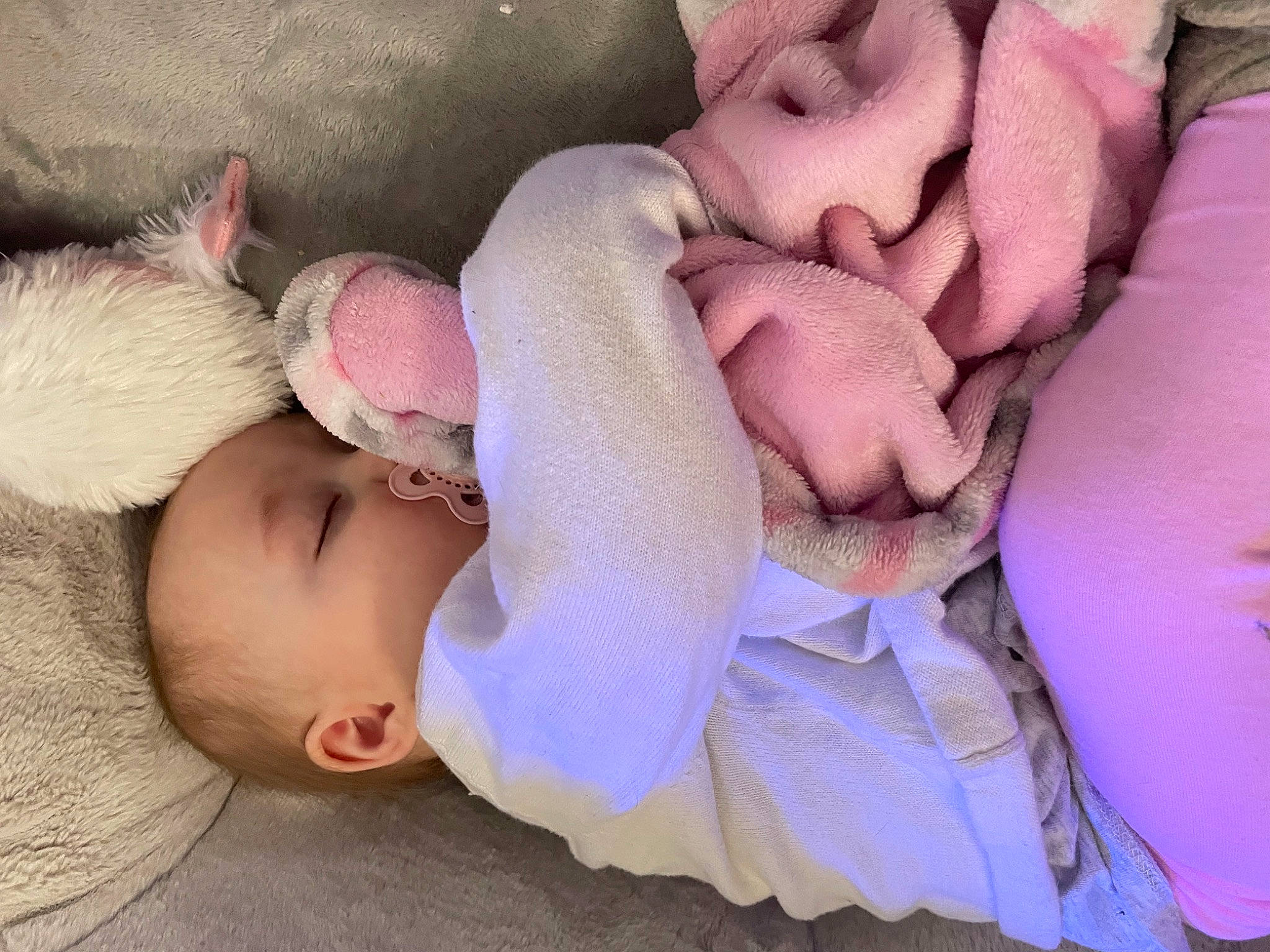 Aryah is registered to the contest to win money with this photo: baby, baby_products, baby_sleeping, baby_toddler_clothing, cheek, child, comfort, linens, magenta, nap, pattern, person, pink, plant, product, purple, skin, sleep, textile, toddler