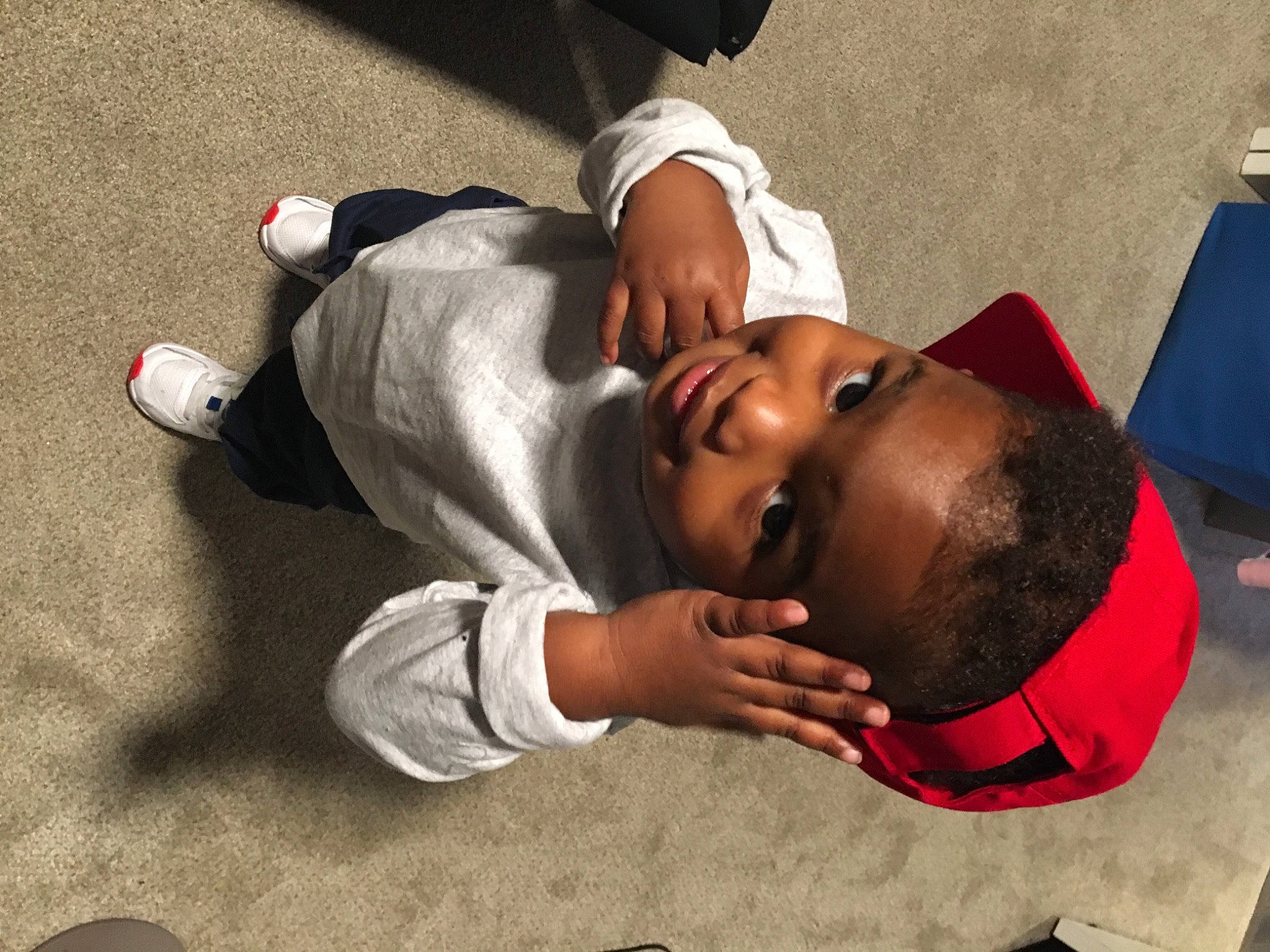 Ayvin joined the competition — help win amazing prizes! child, comfort, elbow, eyewear, flooring, fun, happy, hat, joint, knee, leisure, mammal, person, sitting, smile, sunglasses, t_shirt, toddler, vertebrate