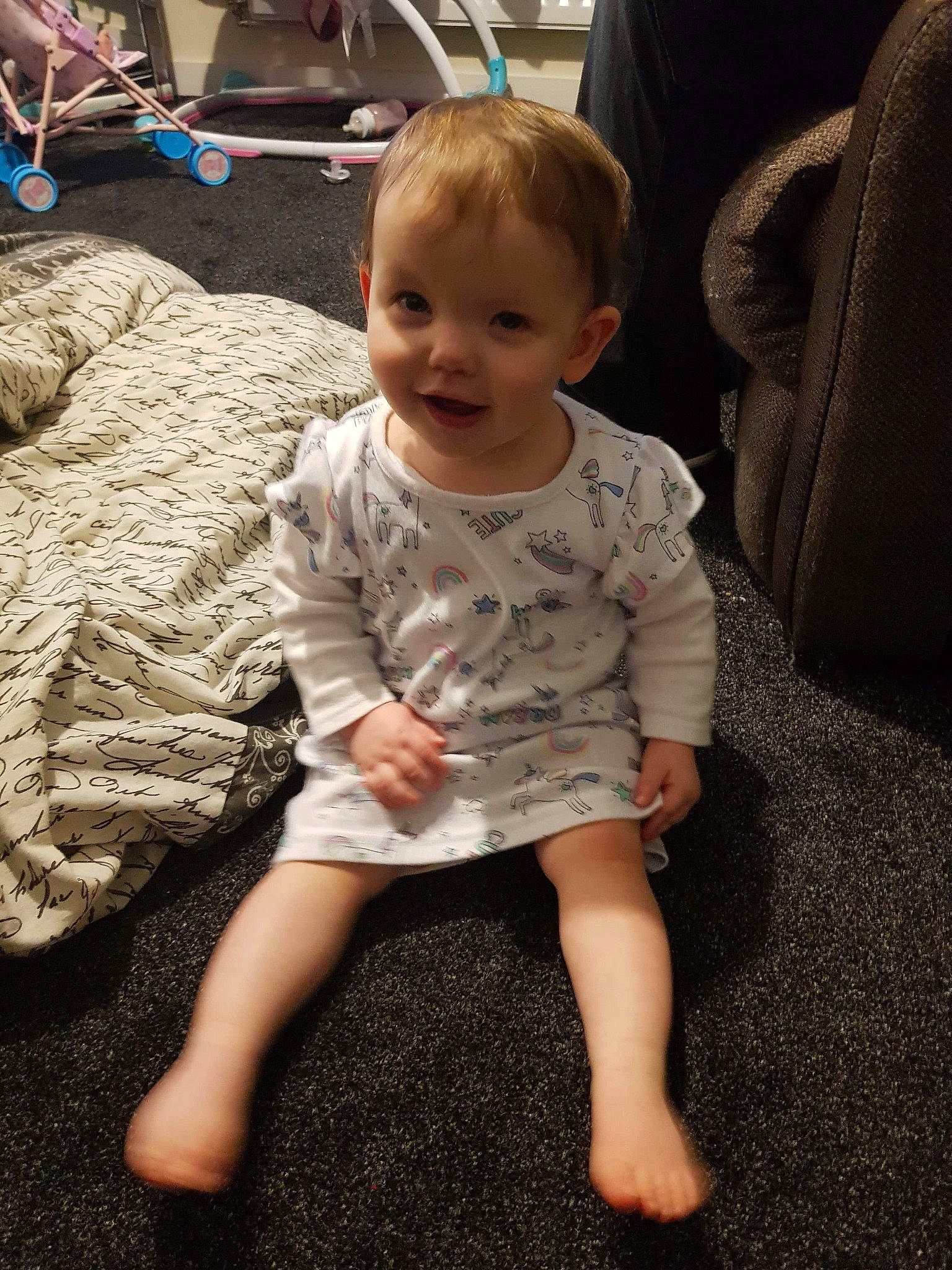 Kaitlyn joined the competition — help win amazing prizes! arm, baby, barefoot, cheek, child, floor, flooring, foot, fun, head, human_leg, joy, leg, person, play, sitting, skin, smile, standing, toddler