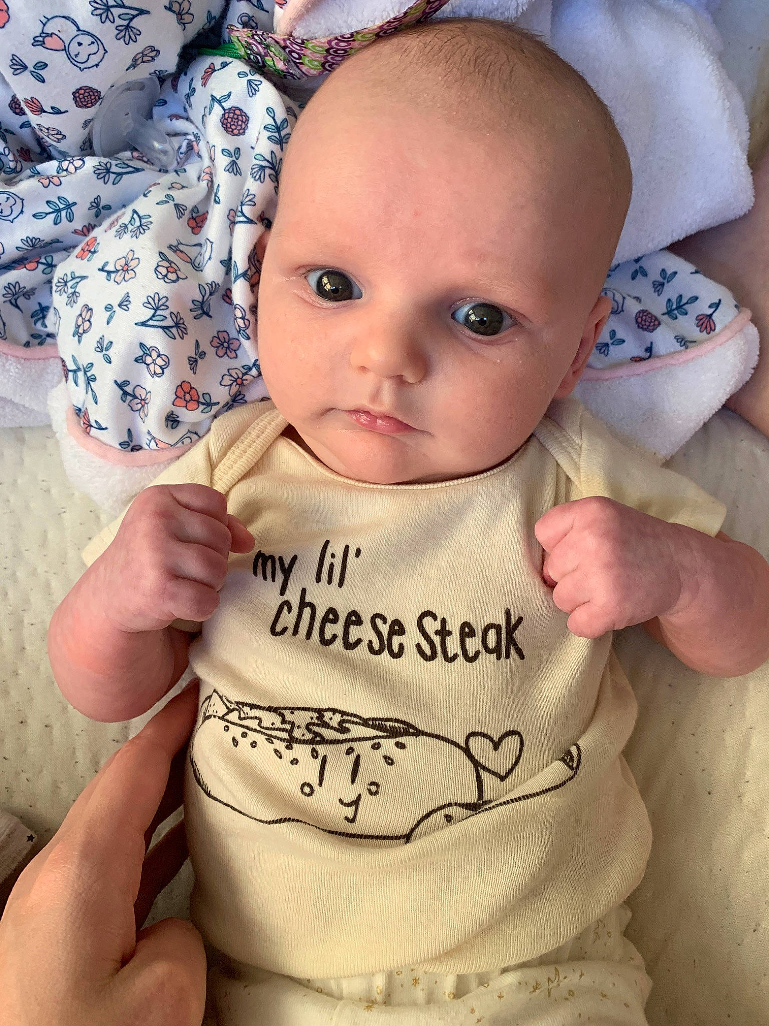 Deltah is registered to the contest to win money with this photo: baby, baby_toddler_clothing, cheek, child, face, finger, forehead, head, lip, nose, person, skin, smile, toddler