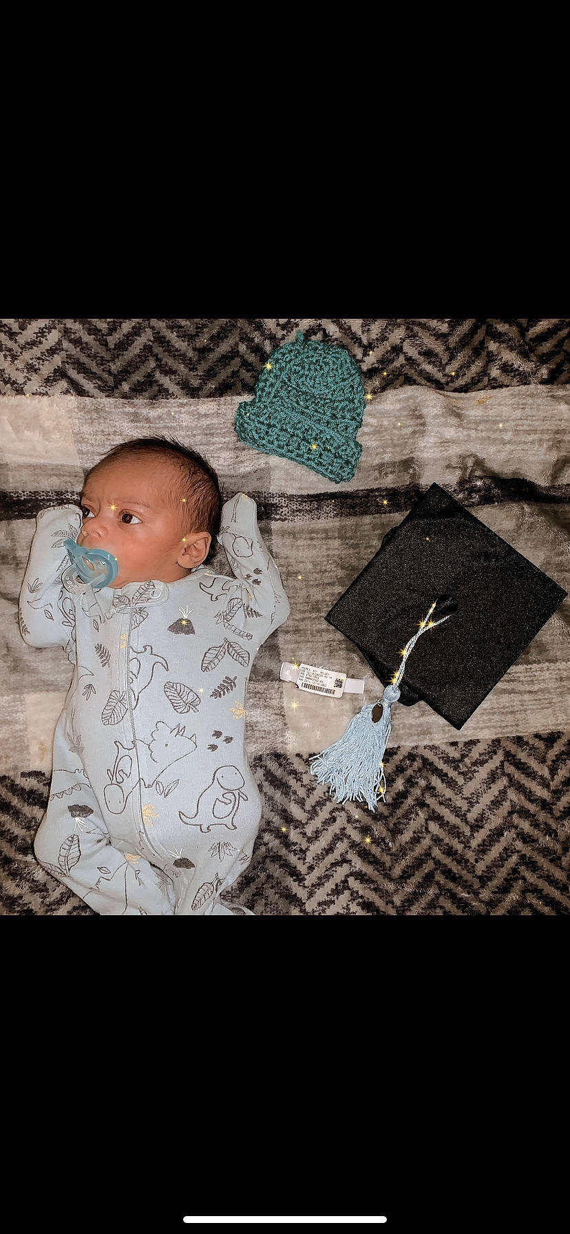 Martin is registered to the contest to win money with this photo: baby, baby_products, baby_sleeping, baby_toddler_clothing, child, comfort, denim, flooring, grey, linens, pattern, person, product, rectangle, room, sleeve, t_shirt, textile, toddler, wood