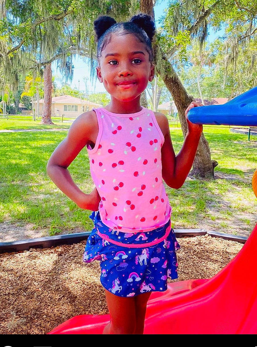 Brielle is registered to the contest to win money with this photo: baby_toddler_clothing, child, electric_blue, fun, grass, green, happy, joy, leisure, magenta, morning, people_in_nature, person, pink, plant, recreation, sleeve, smile, summer, toddler