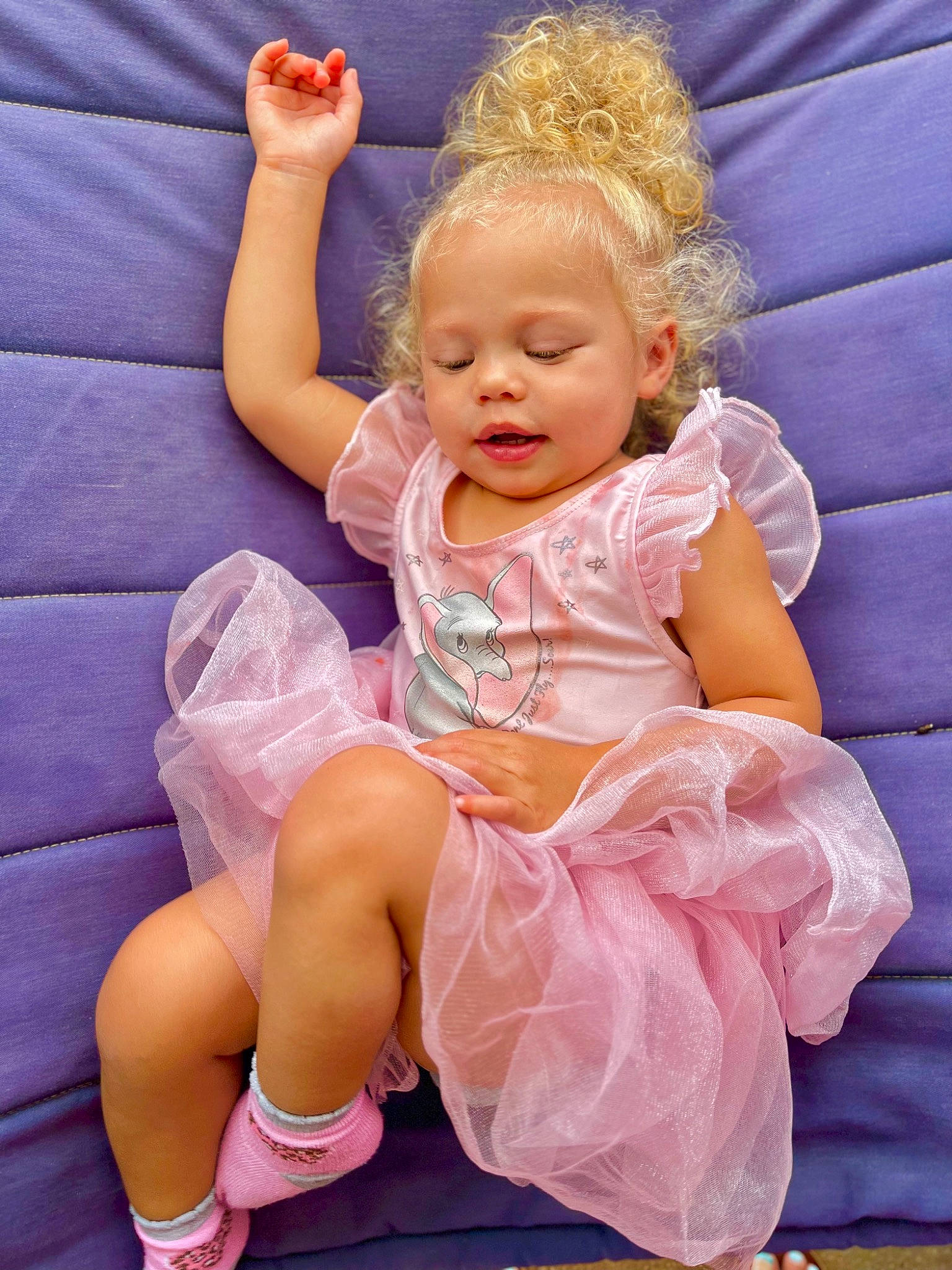 Kami joined the competition — help win amazing prizes! baby, baby_toddler_clothing, blond, child, comfort, event, finger, fun, gesture, happy, human_leg, leg, person, pink, product, purple, sitting, skin, sock, thigh