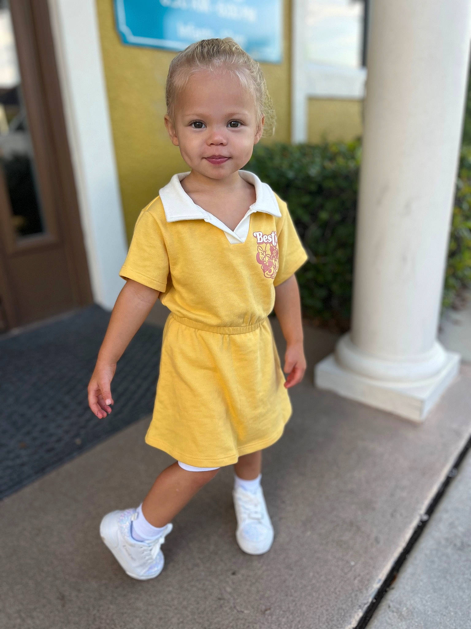 Kami joined the competition — help win amazing prizes! baby, baby_toddler_clothing, child, door, dress, flooring, fun, grass, happy, human_leg, knee, leisure, pattern, person, picture_frame, sleeve, sock, standing, t_shirt, toddler