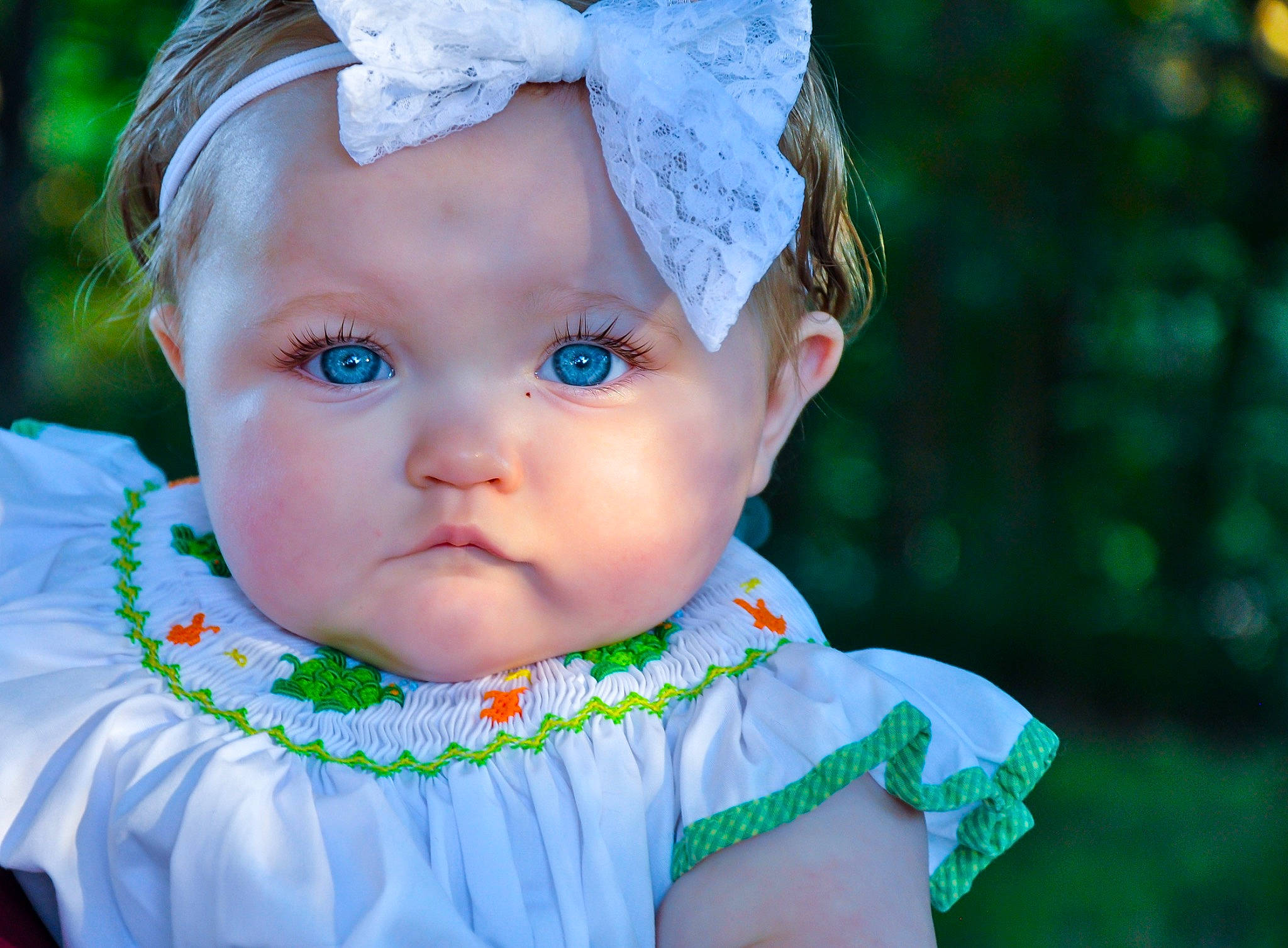 Paisley joined the competition — help win amazing prizes! baby, baby_toddler_clothing, cheek, chin, eye, eyebrow, eyelash, face, flash_photography, grass, green, hair, happy, head, headwear, iris, lip, nose, person, skin
