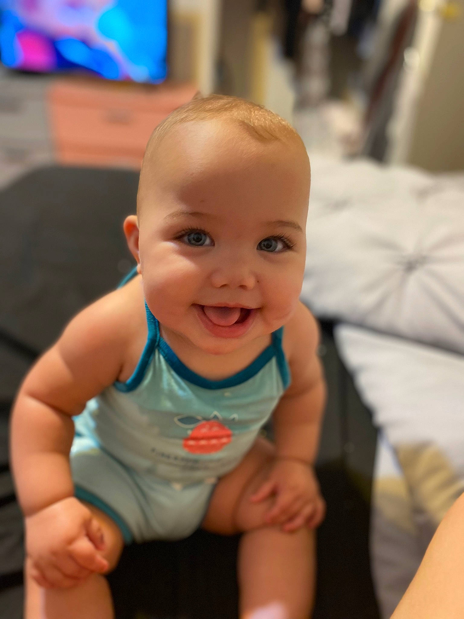 Nayana is registered to the contest to win money with this photo: baby_toddler_clothing, cheek, chin, eye, eyebrow, face, facial_expression, finger, fun, gesture, hand, happy, head, iris, joy, mouth, nose, person, skin, smile