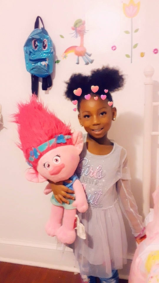 Adina is registered to the contest to win money with this photo: child, doll, joy, person, pink, stuffed_toy, toy