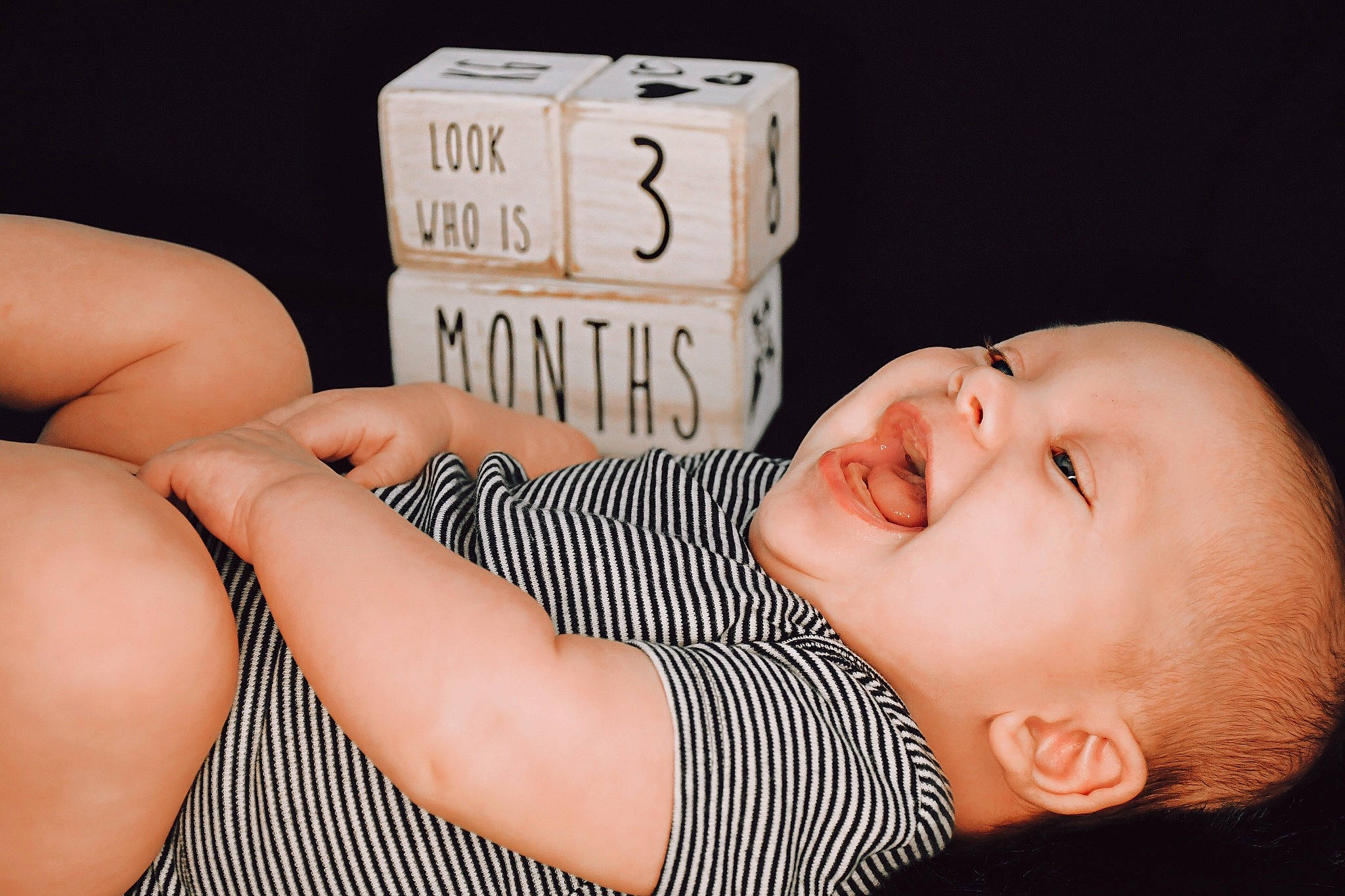 Colby joined the competition — help win amazing prizes! baby, baby_toddler_clothing, comfort, couch, elbow, finger, flash_photography, hairstyle, hand, happy, human_body, human_leg, muscle, person, skin, sleeve, smile, thigh, toddler, wood