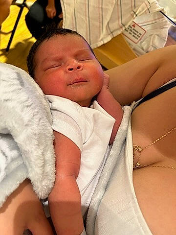 Alan is registered to the contest to win money with this photo: abdomen, baby, baby_products, baby_sleeping, bedtime, chest, child, comfort, fur, gesture, human_leg, linens, nap, person, room, sitting, skin, thigh, thumb, toddler