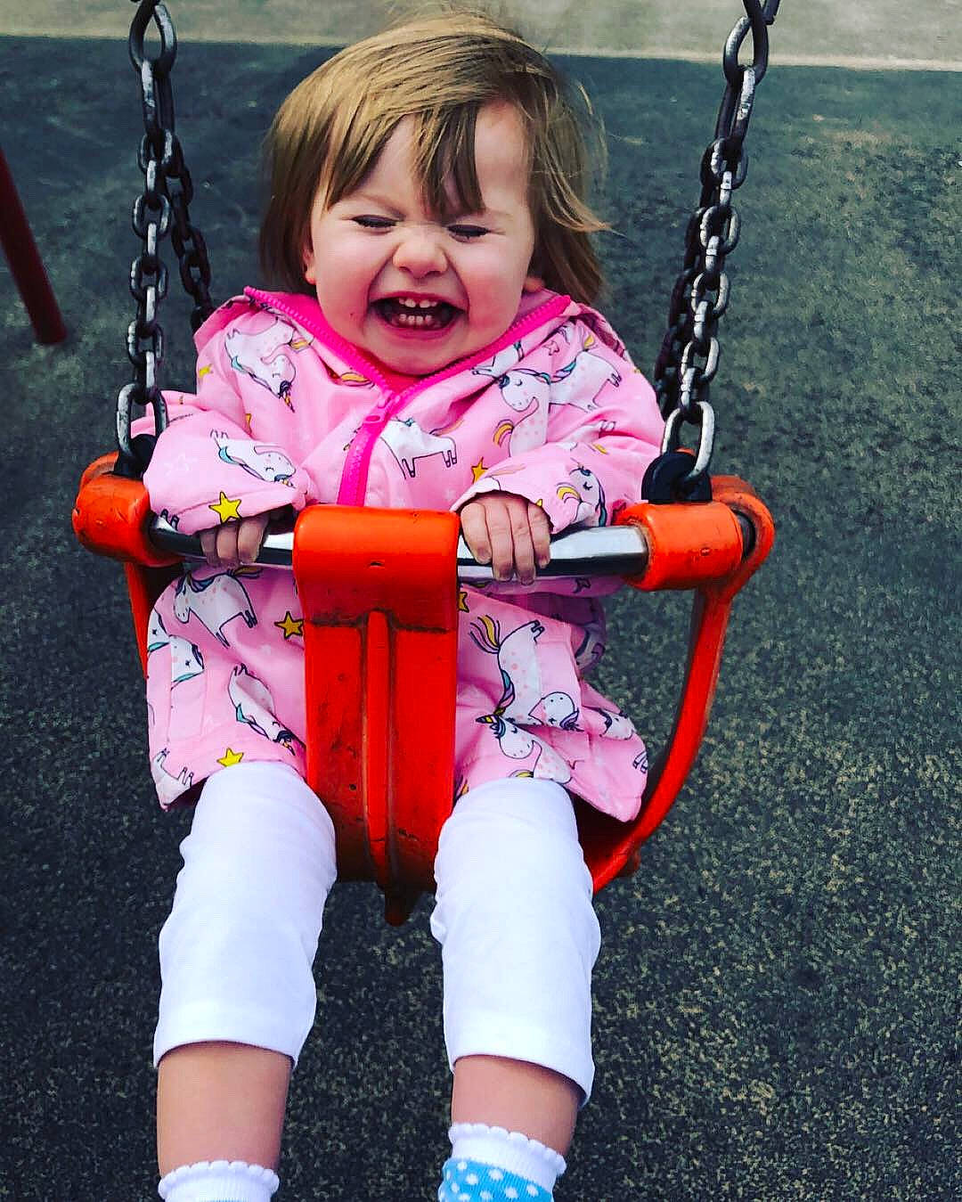 Ava-grace joined the competition — help win amazing prizes! baby_products, child, fun, happy, outdoor_play_equipment, person, pink, play, playground, public_space, smile, swing, toddler