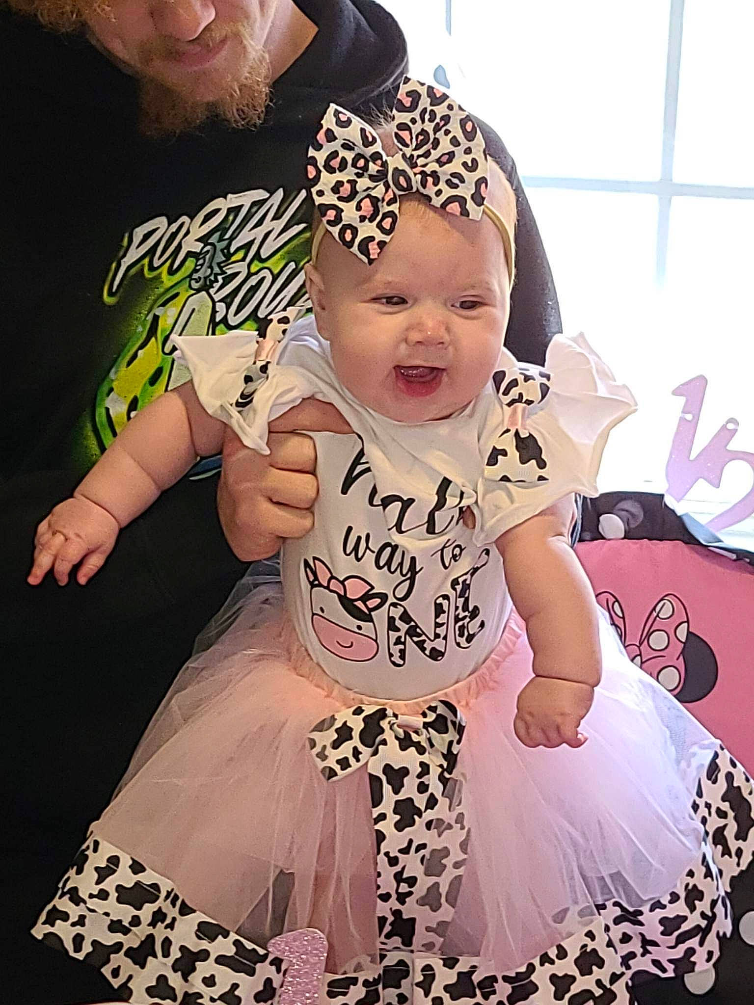 Reagan is registered to the contest to win money with this photo: arm, baby, baby_toddler_clothing, beauty, child, clothing, cool, dress, event, face, happy, hat, headpiece, headwear, pattern, person, photograph, pink, sleeve, t_shirt