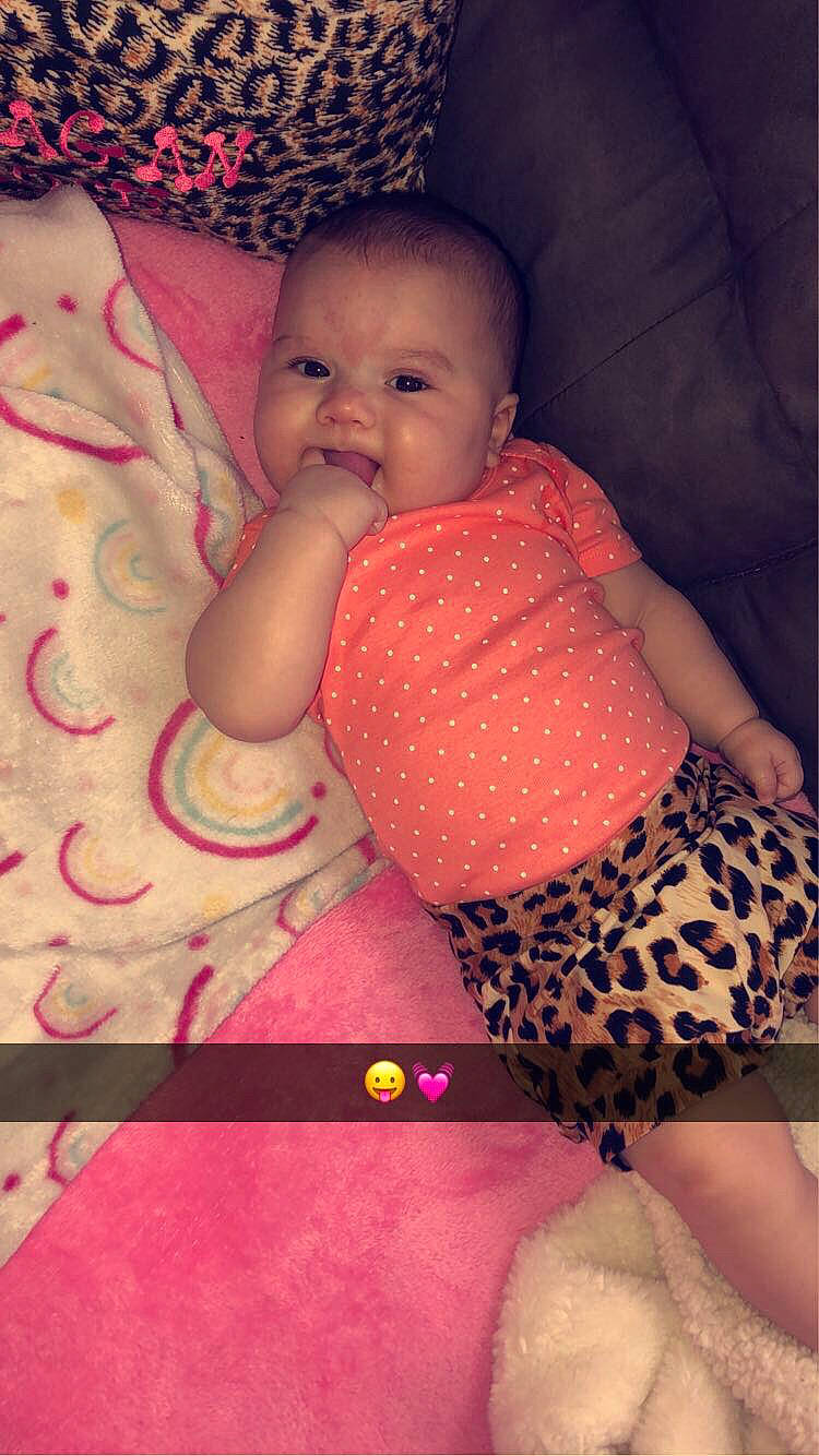 Reagan joined the competition — help win amazing prizes! arm, baby, baby_toddler_clothing, eye, facial_expression, finger, human_body, lip, mouth, muscle, organ, person, pink, shorts, skin, smile, stomach, textile, thigh, toddler