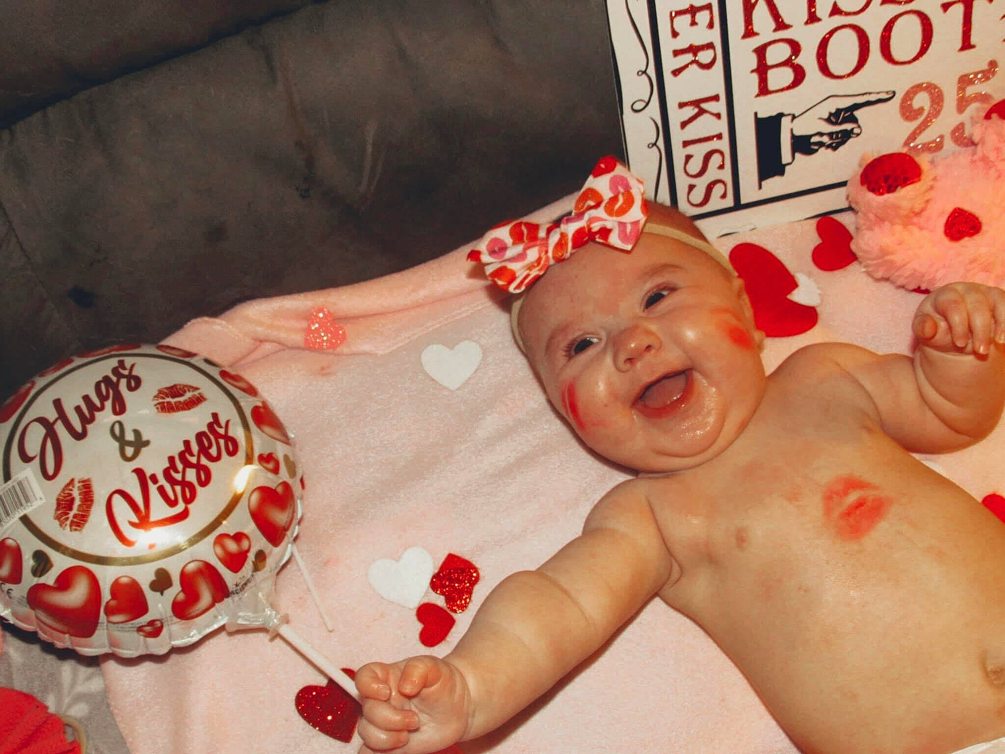 Reagan is registered to the contest to win money with this photo: baby, baby_products, baby_toddler_clothing, bathing, cake, carmine, chest, child, event, finger, flesh, happy, head, headwear, holiday, mouth, person, smile, sugar_cake, sweetness