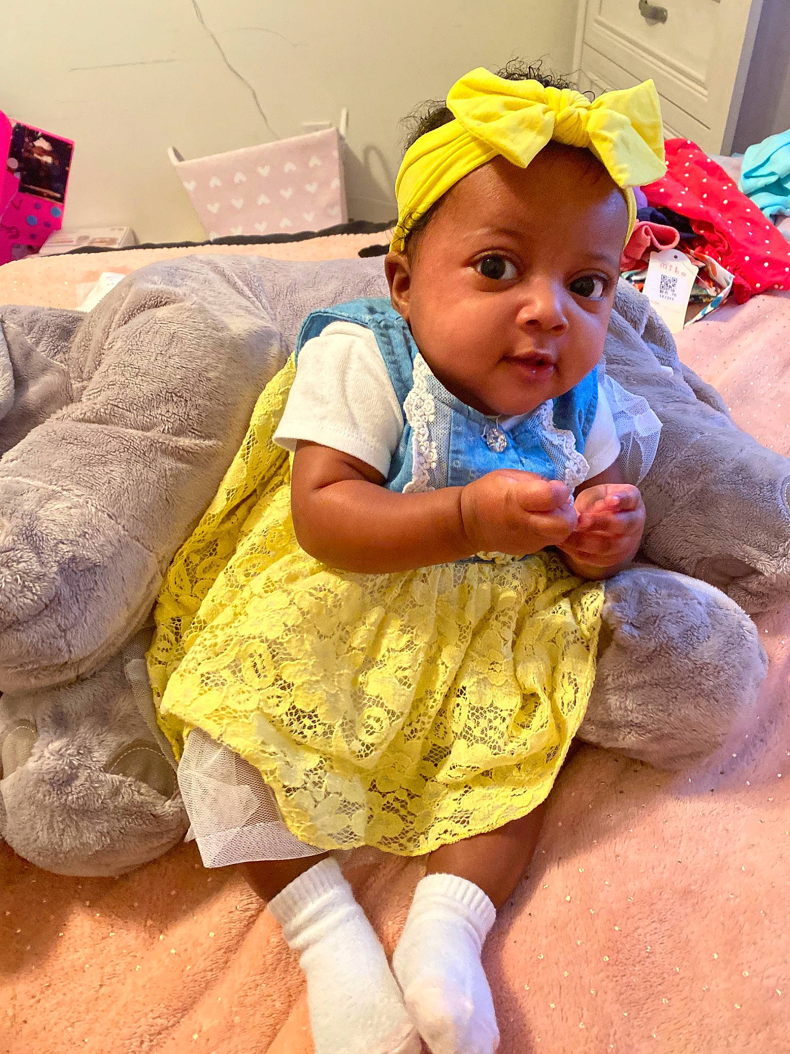 Ikora is registered to the contest to win money with this photo: baby, child, person, play, skin, smile, toddler, yellow