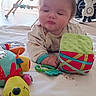 Timéo participe au concours pour gagner de l'argent avec cette photo : baby, baby_gym, blanket, child, clothing, colorful, comfort, crawling, cute, expression, face, floor, home, indoor, infant, plant, play, portrait, soft_toy, toys