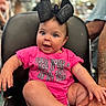 Haddie joined the competition — help win amazing prizes! baby, child, blue_eyes, bow, pink_shirt, sitting, smiling, furniture, person, happy, indoor, nail_polish, clothing, cute, portrait, infant, hand, foot, tattooed_arm, chair